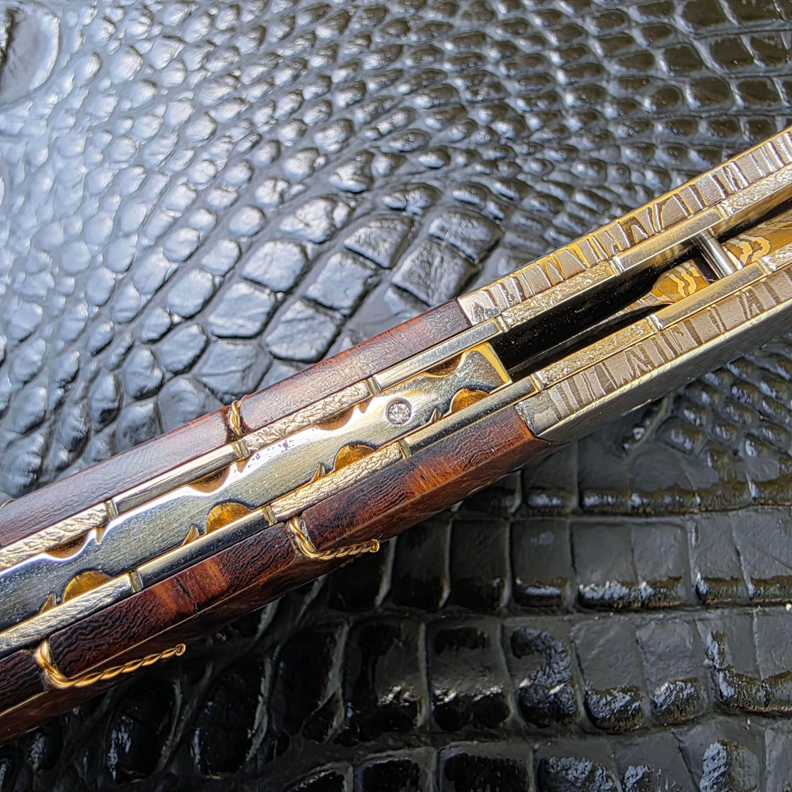 Gemstone inlay on back strap of Bill Coffey Custom Folding Dagger