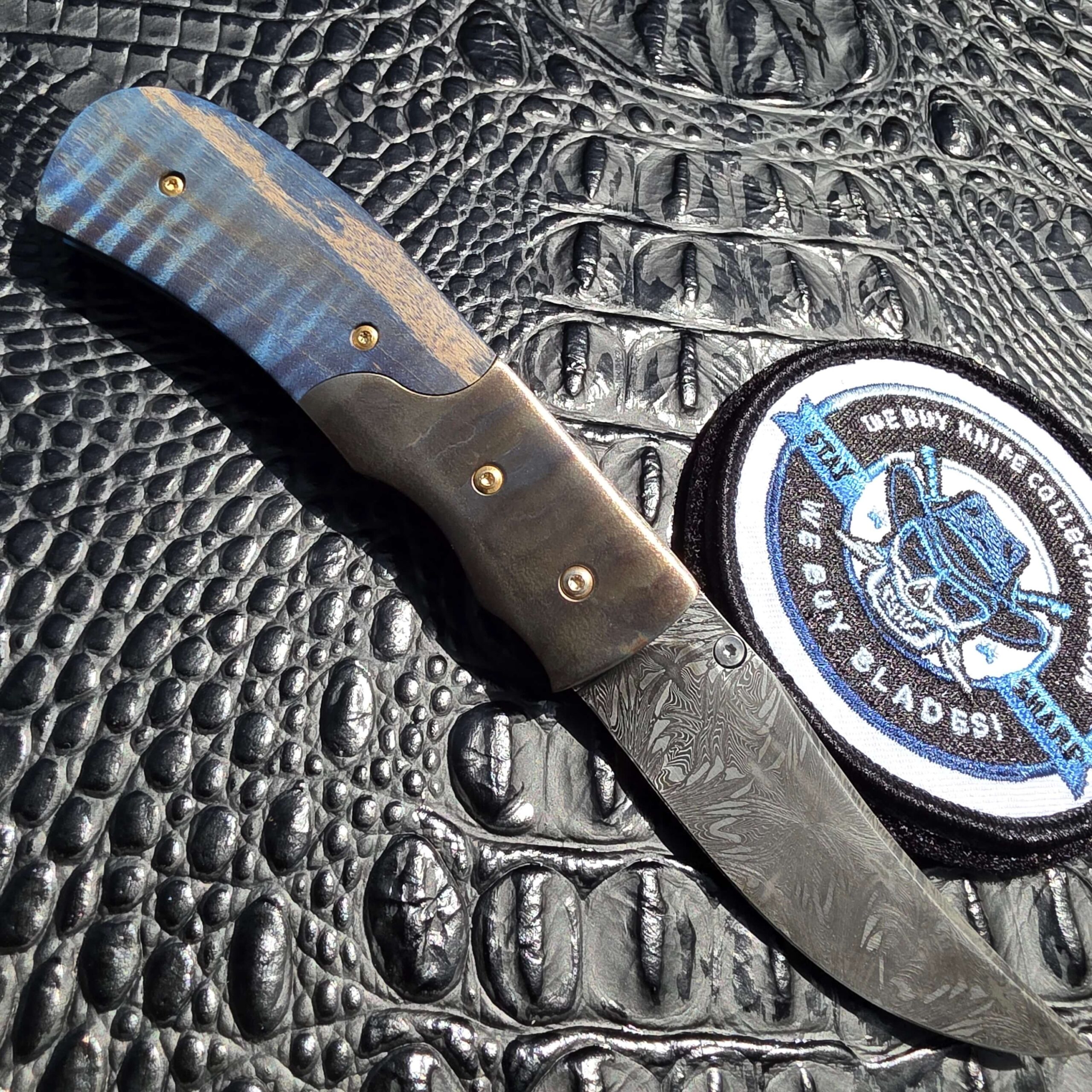 Open clip-side view of Bill Poor Custom Mosaic Damascus Knife