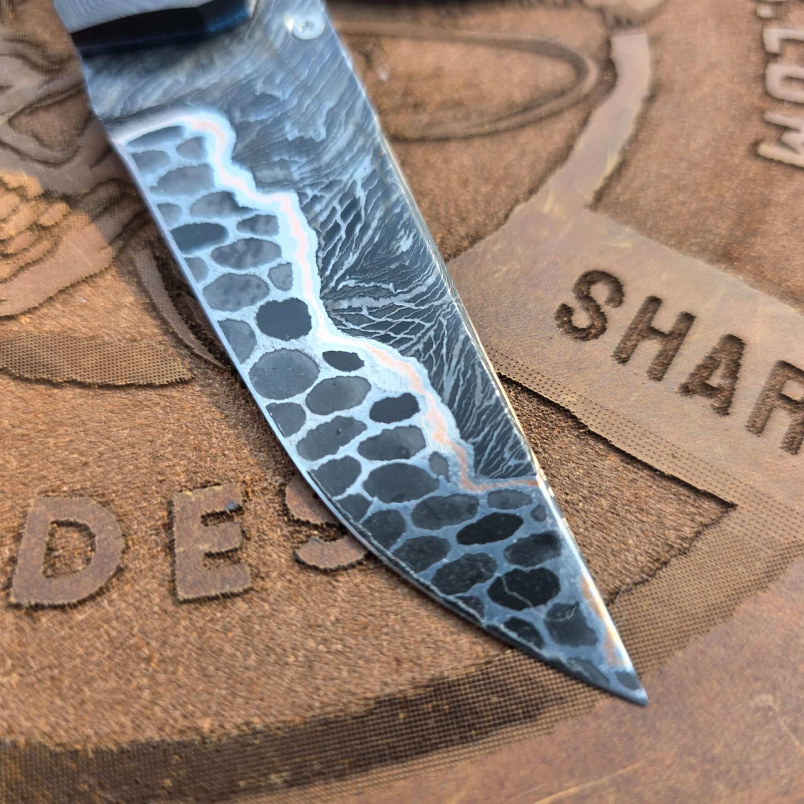 Copper Deville Damascus pattern detail on Brian Milinski Il Bastione blade
