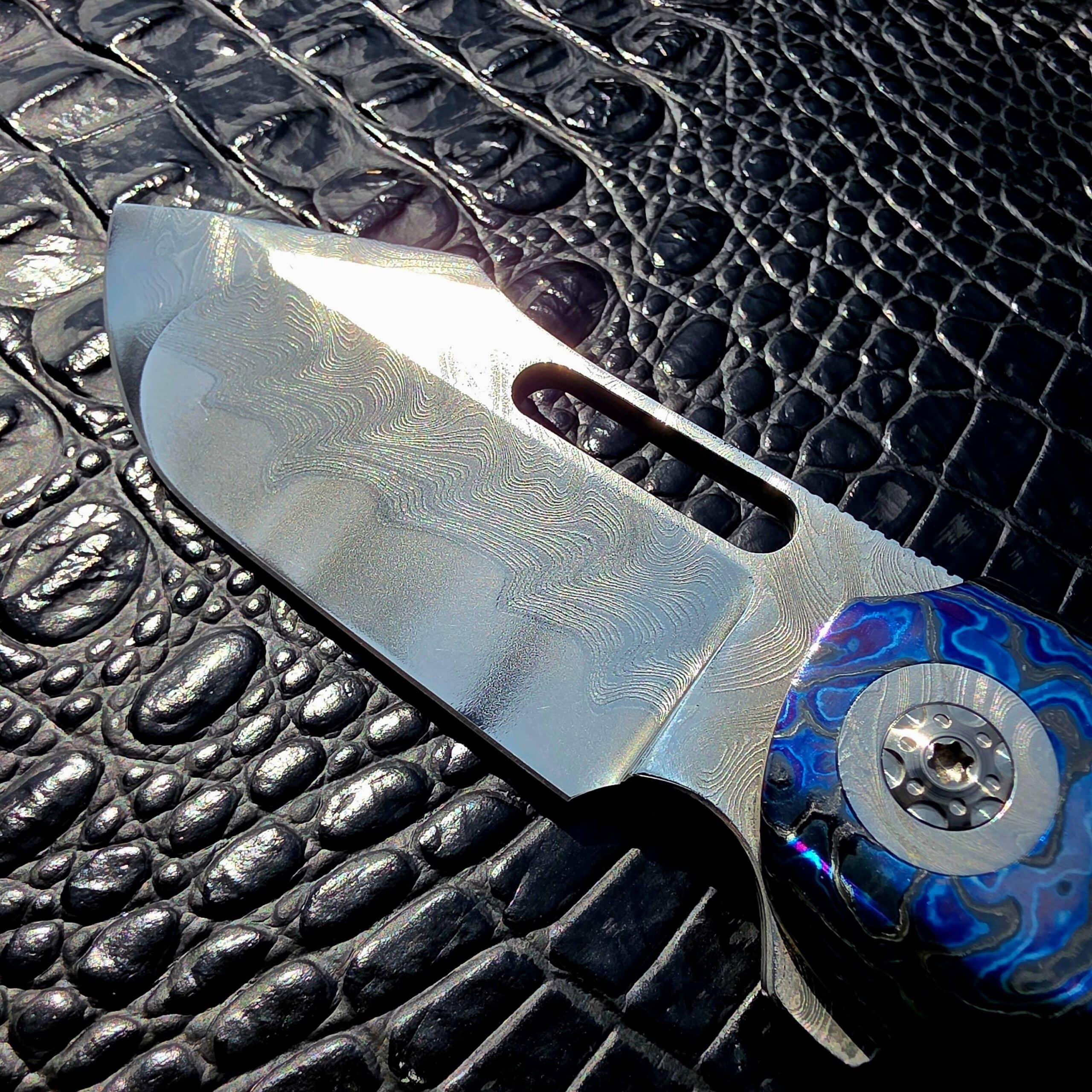 Damasteel blade on Clark Blades Patriot custom folder