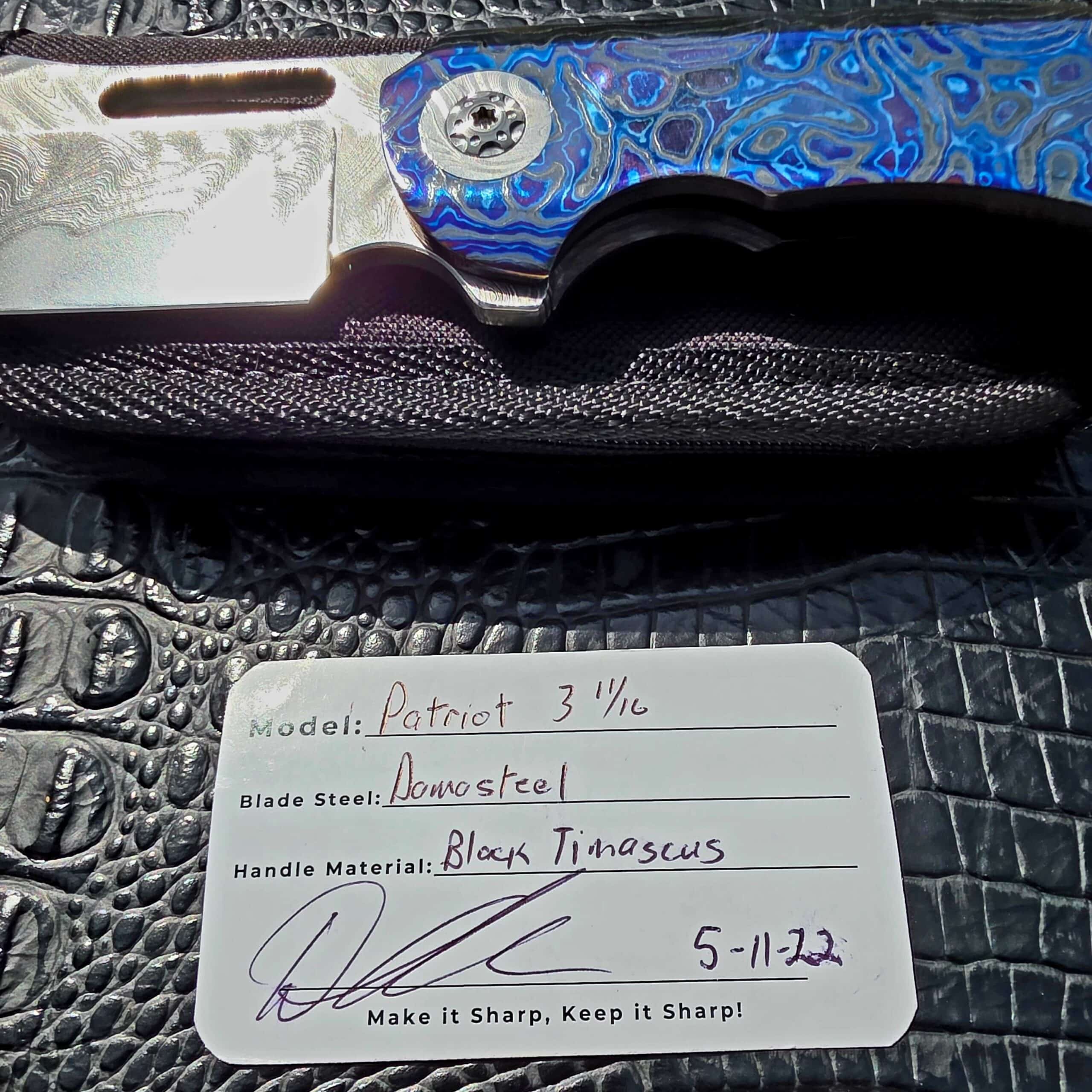 Clark Blades Patriot maker card with Damasteel and Black Timascus details