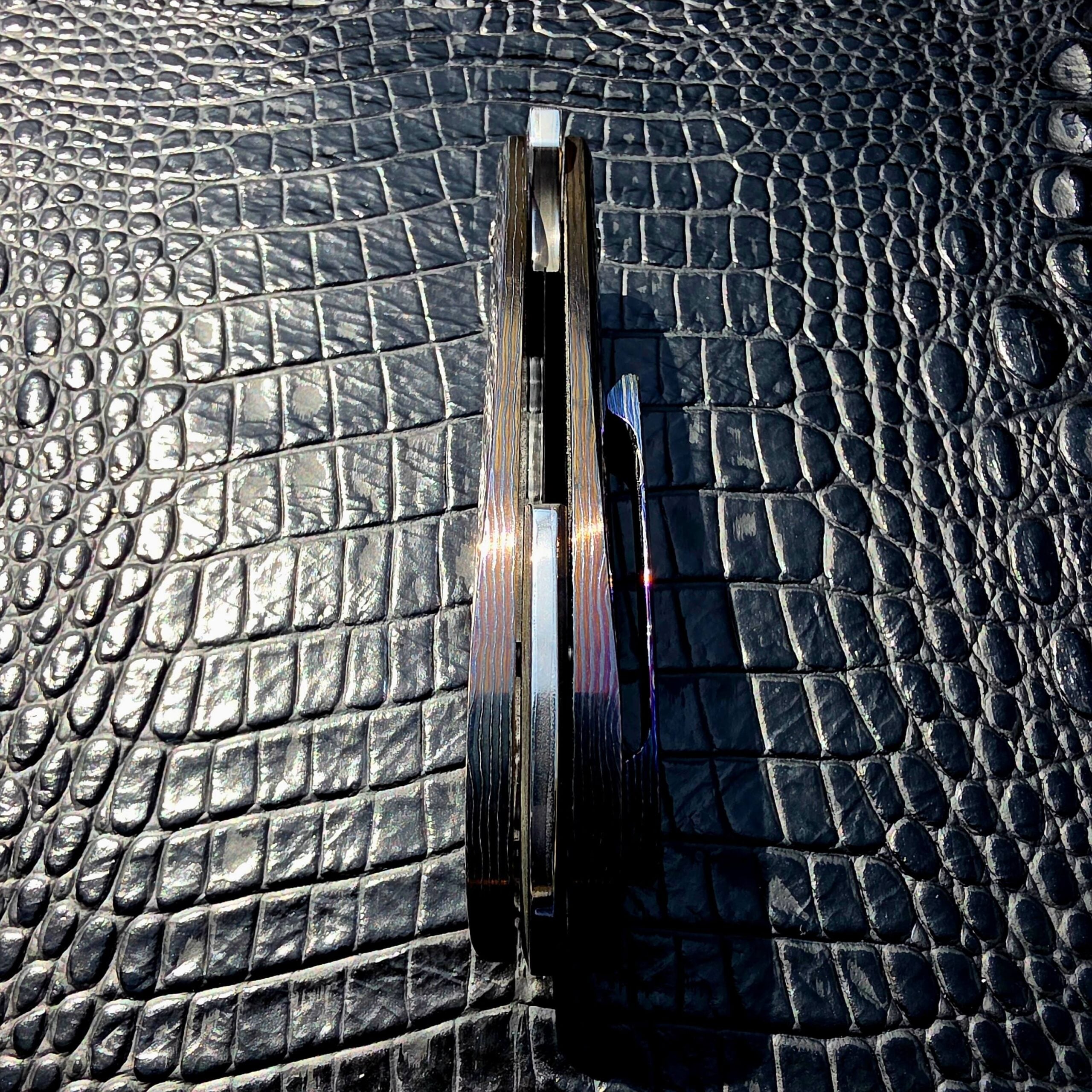 Polished titanium backspacer on Clark Blades Patriot