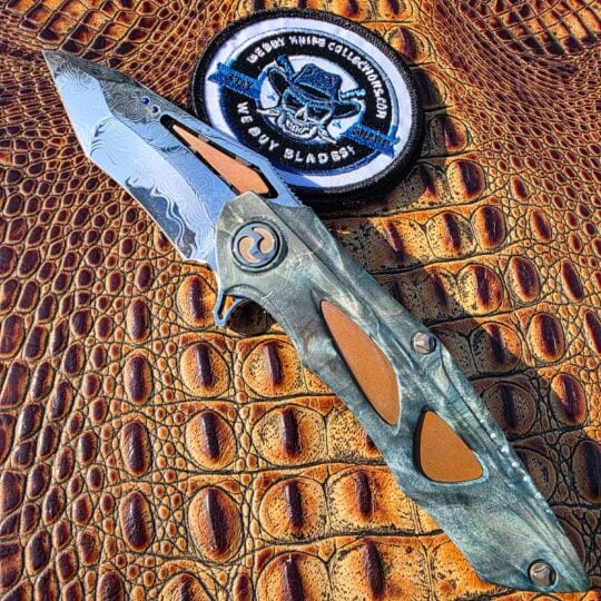 Dew Hara Noah Flipper with San Mai Damascus blade and stabilized poplar handle