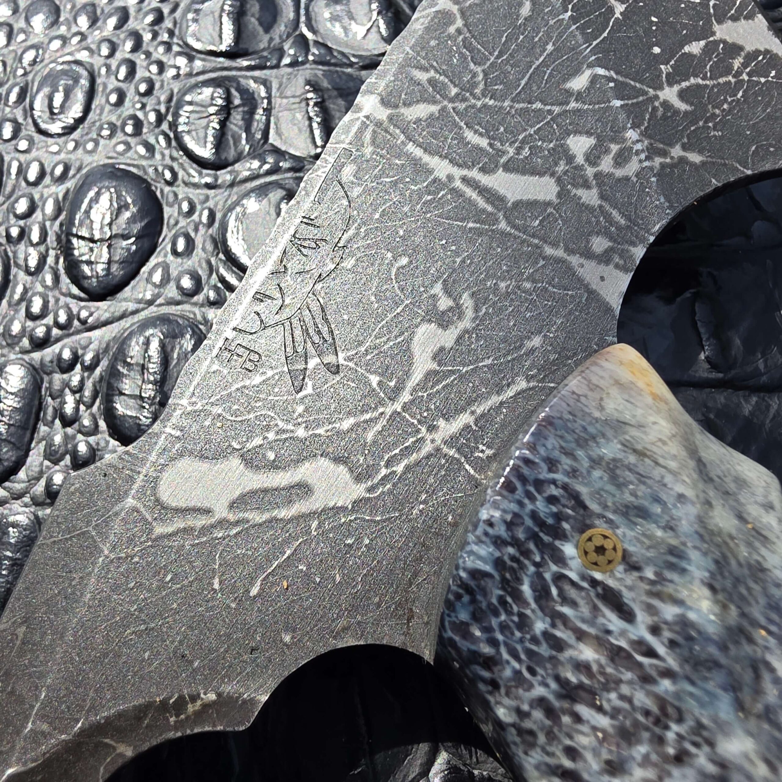 Patterned tomahawk head on Half Face Blades Bleeding Heart Hawk
