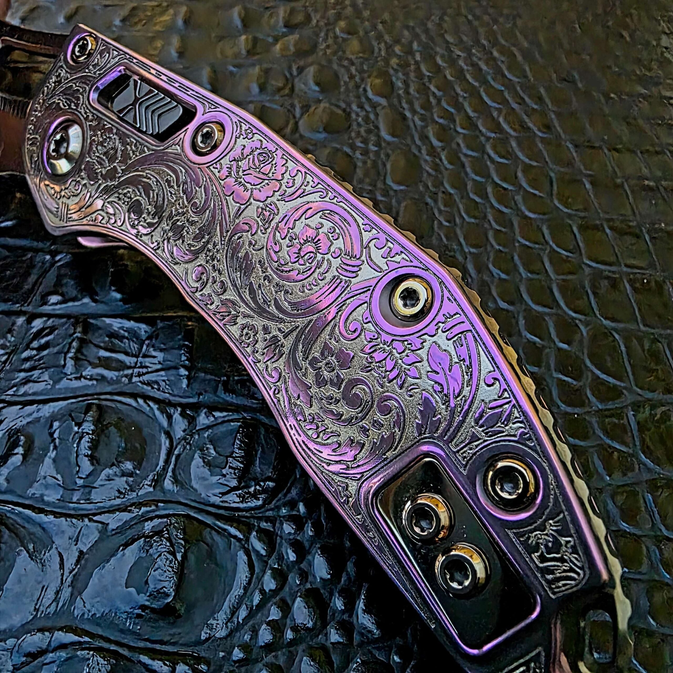 Engraved handle on Microtech Stitch customized by Todd Smith