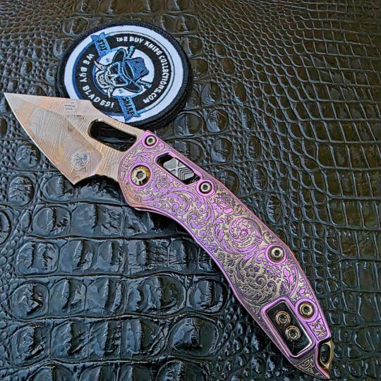 Microtech Stitch customized by Todd Smith with engraved handle and acid etched blade