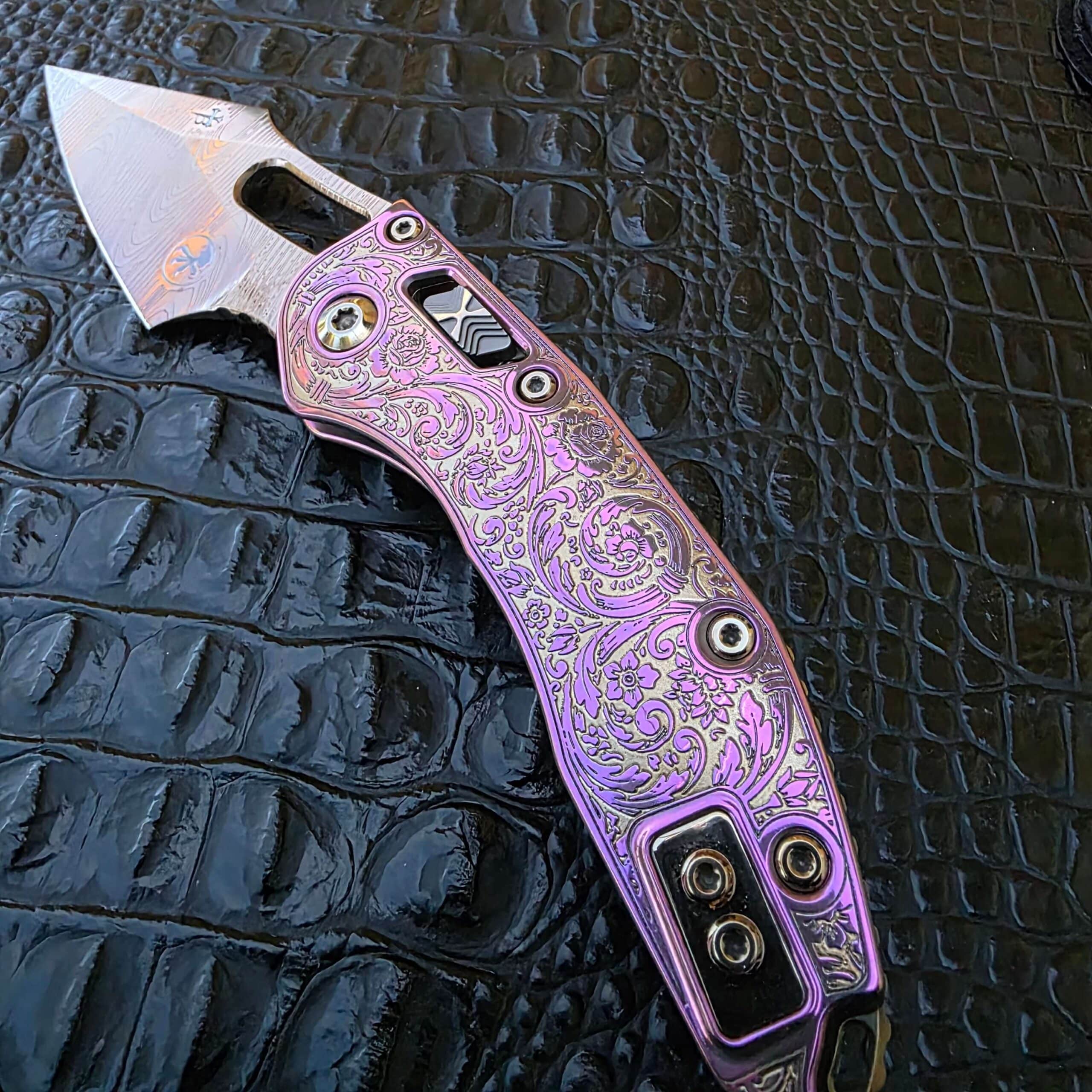 Open show-side view of Microtech Stitch customized by Todd Smith