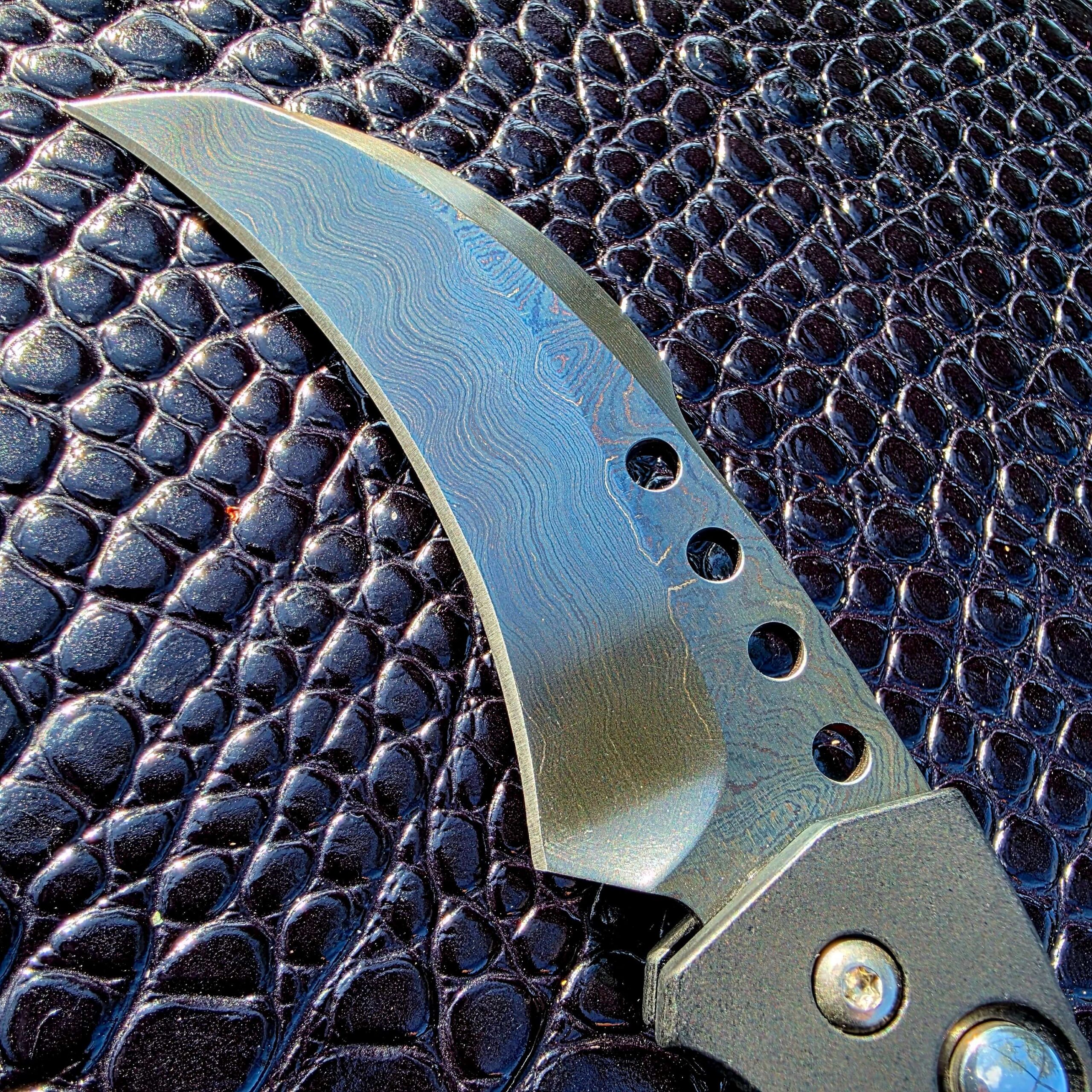 Chisel ground blade detail on Reese Weiland Custom Hawk Gen II