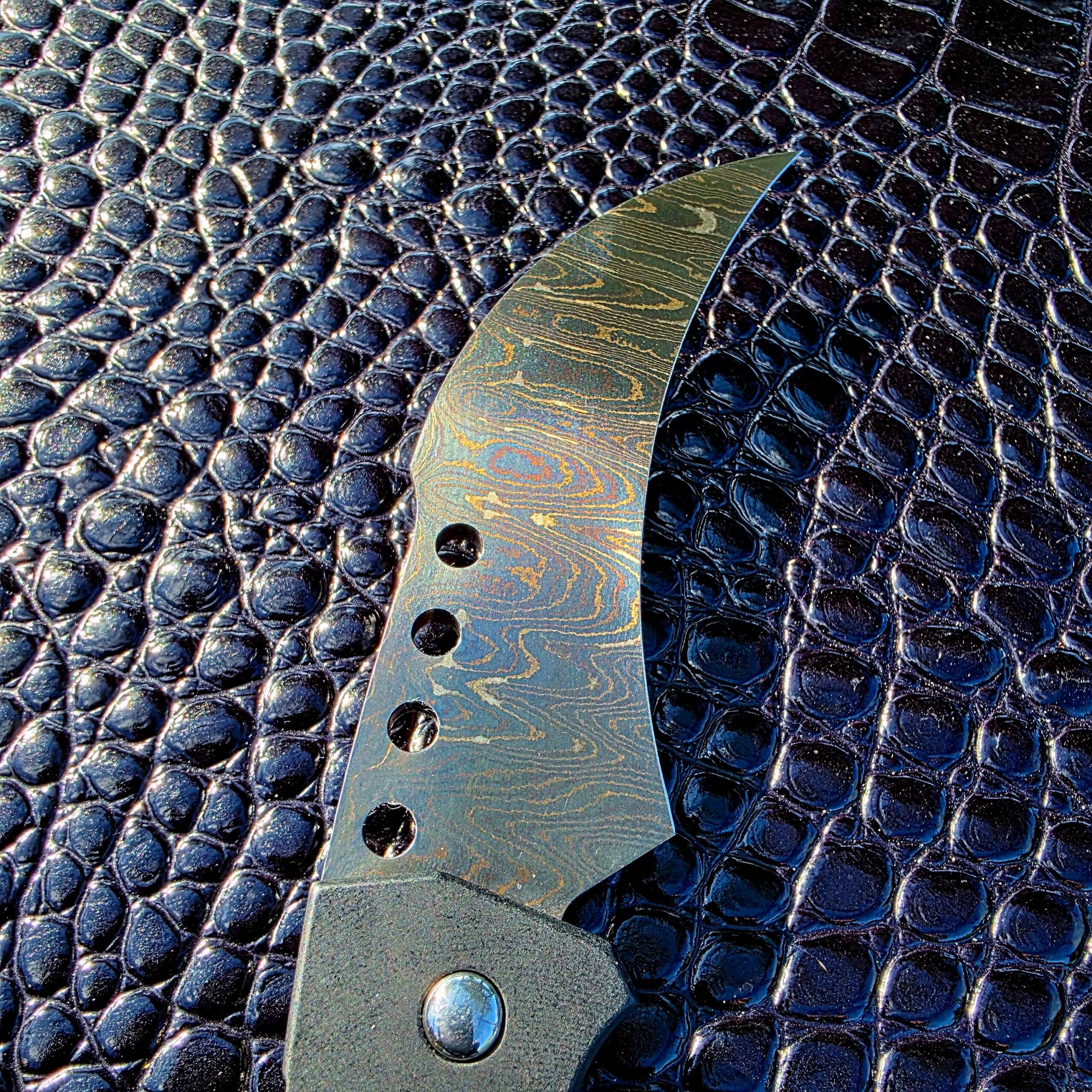 Reese Weiland Hawk Gen II Automatic open with Damascus hawkbill blade