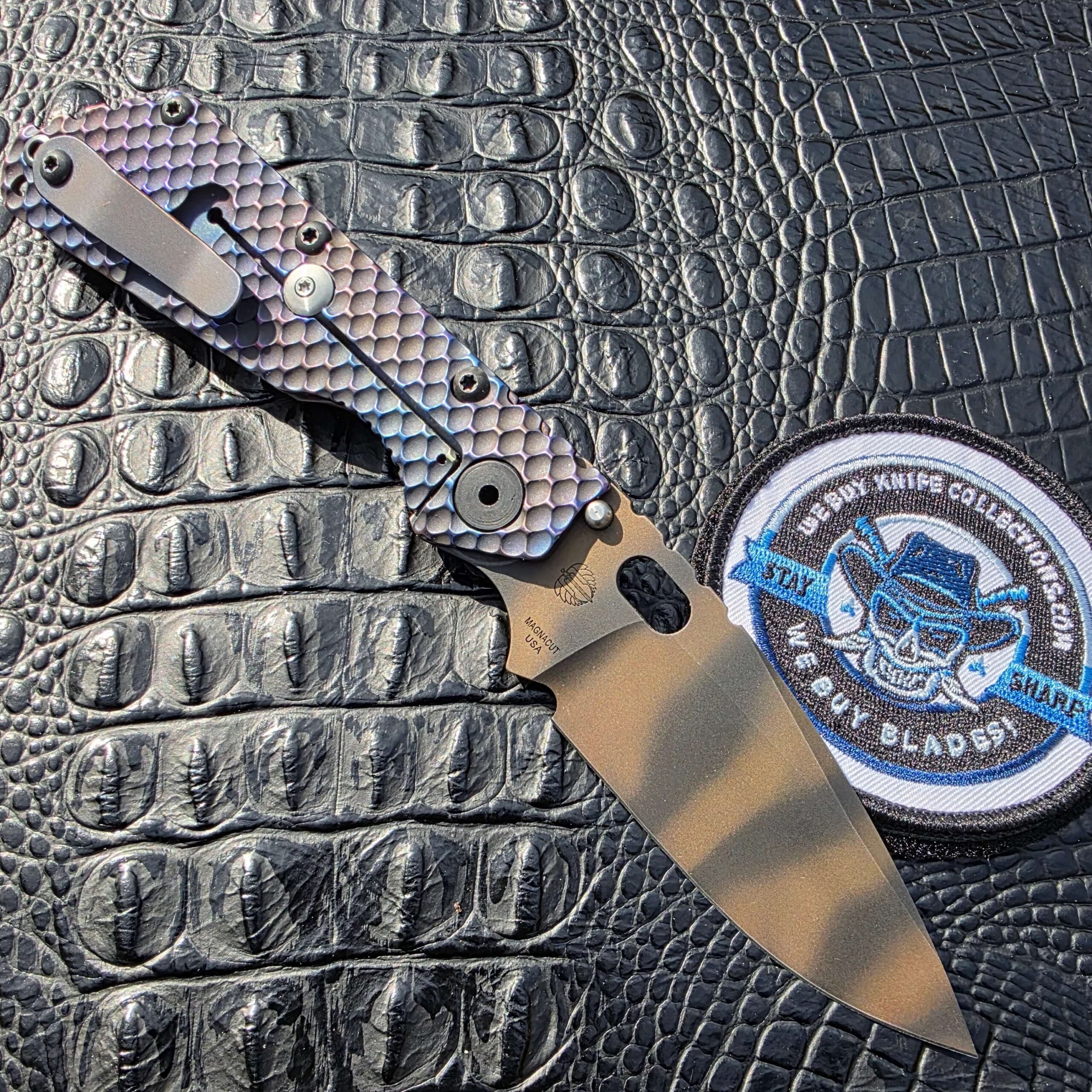 Open clip-side view of Strider SMF Full Titanium DGG with titanium clip