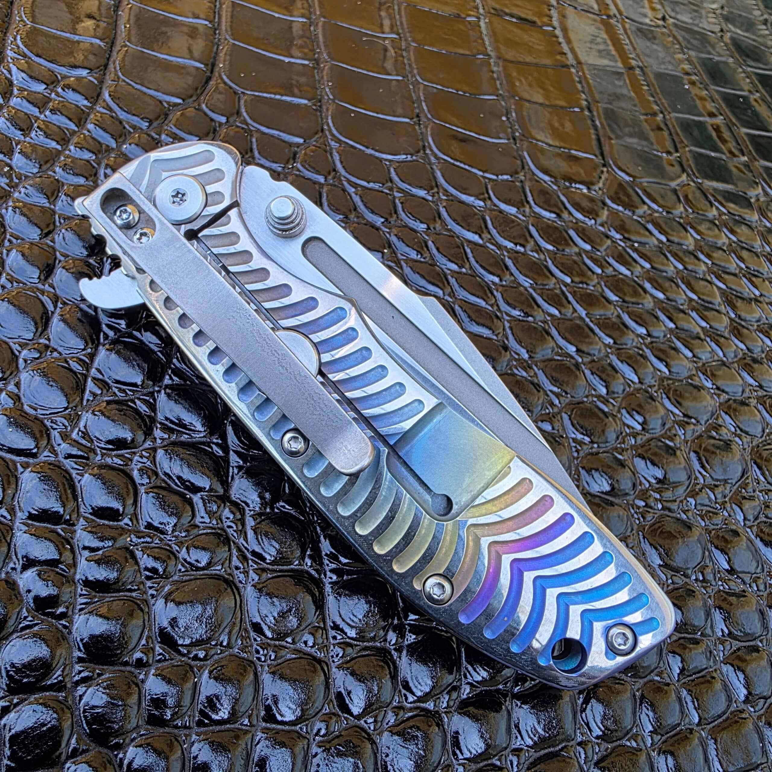 Closed clip-side view of Tim Britton T-10 with titanium pocket clip