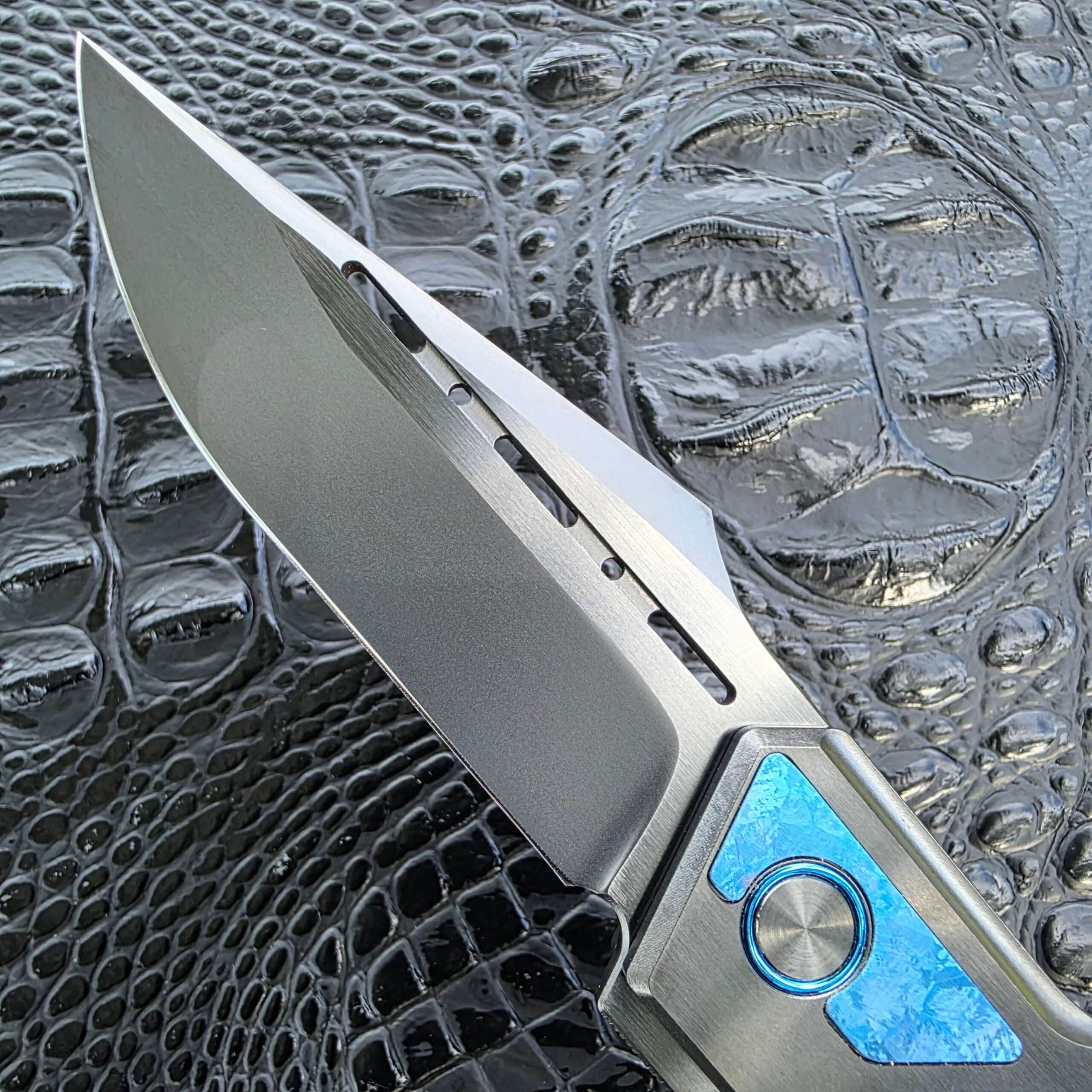 Dew Hara GAIA Serial 001 M390 two-tone DLC blade close-up