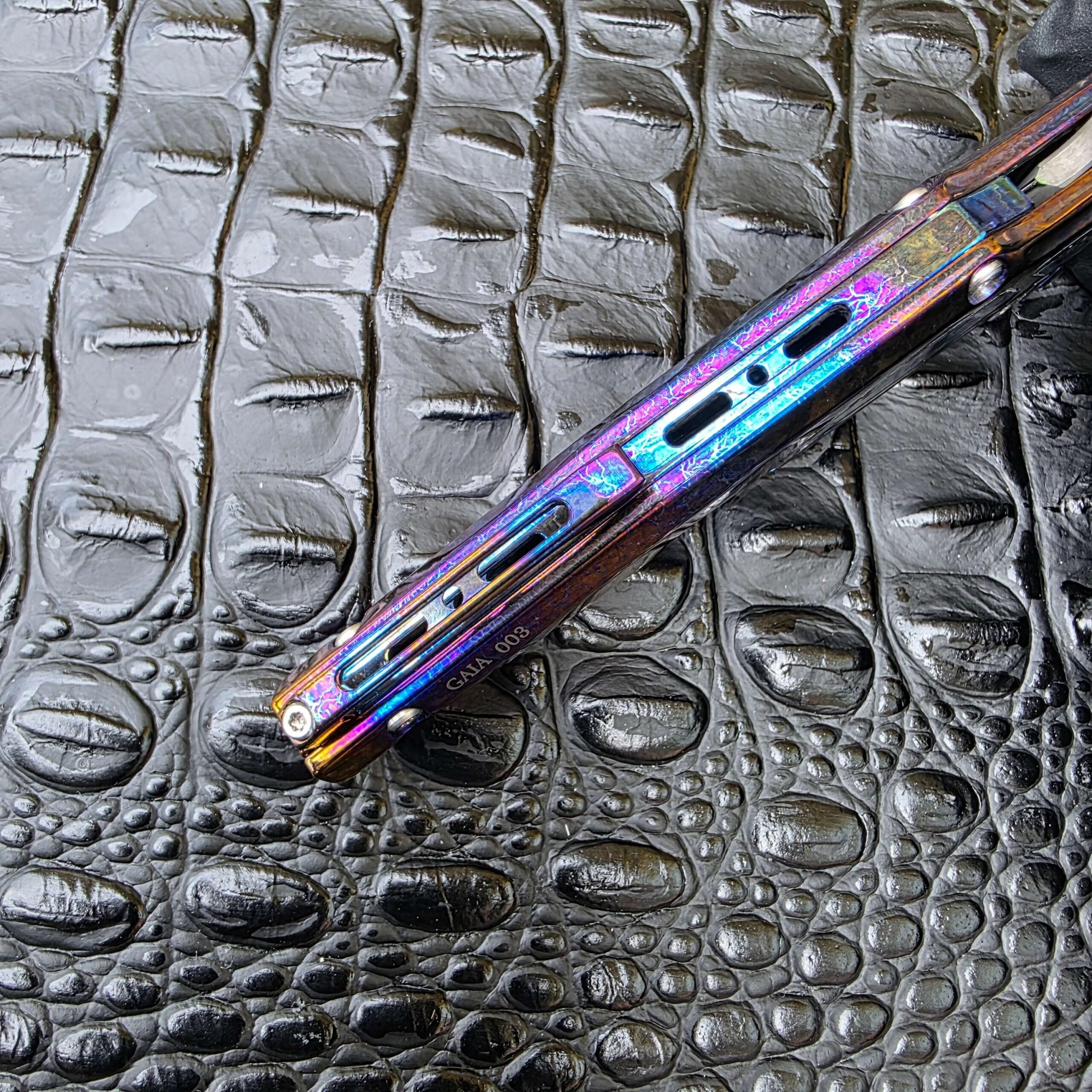 Dew Hara GAIA Serial 003 spine-mounted pocket clip detail