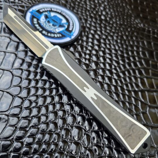 Heretic Manticore X Custom OTF with Elmax tanto blade and Fat Carbon Black Camo inlays