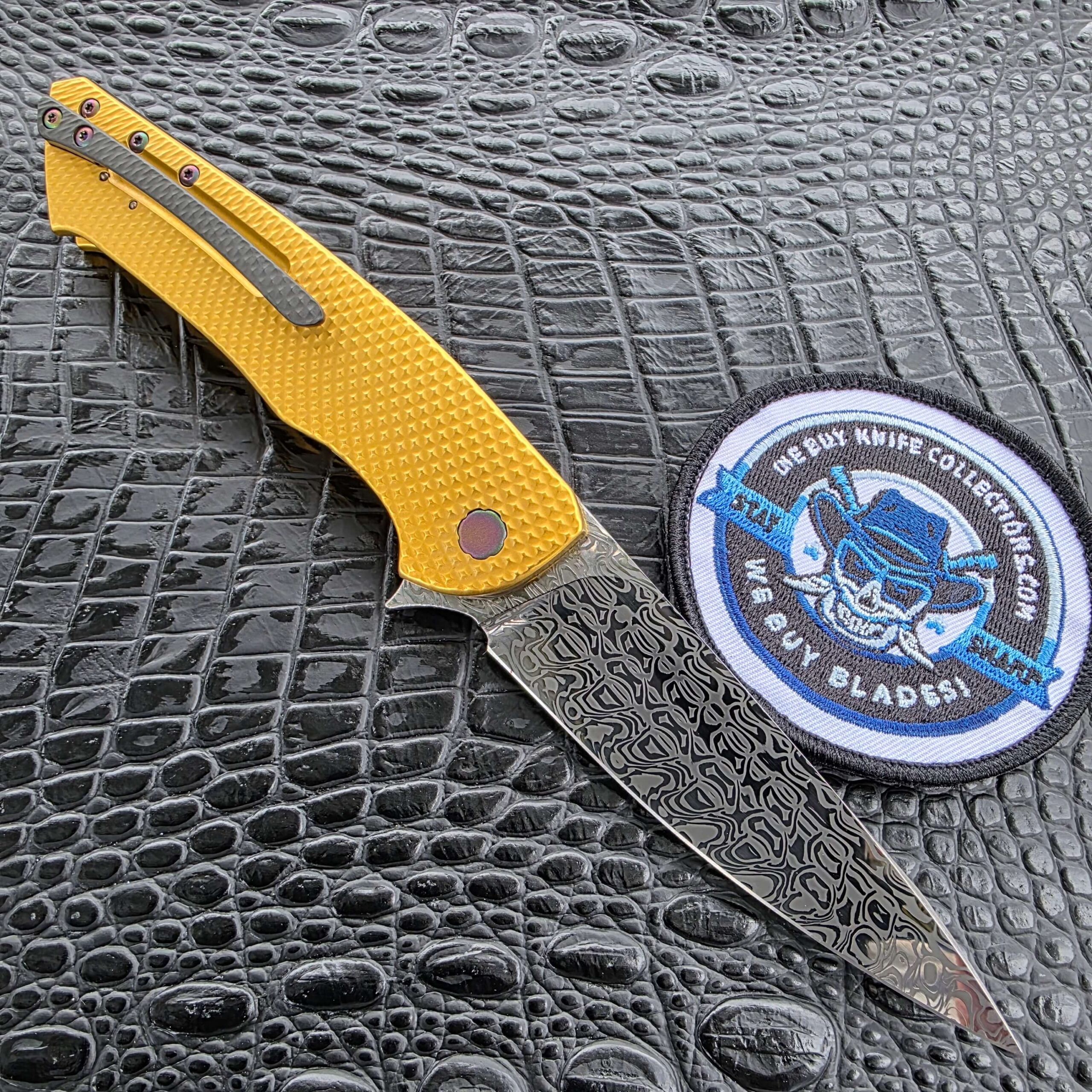 Herman Knives SLIM #0507 open custom folder with Damasteel blade