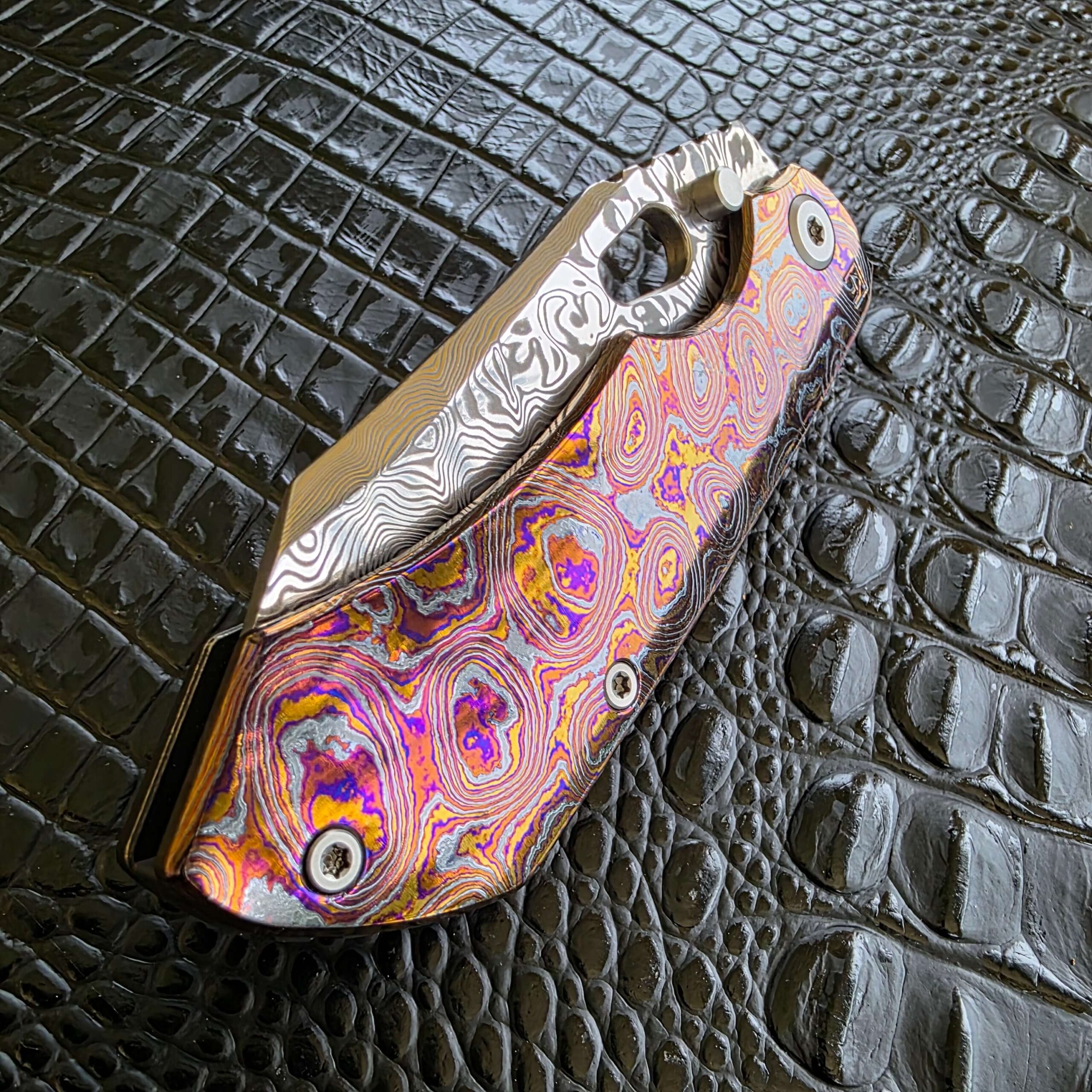 Closed CKF Evo 3.0E with full ZircuTi show-side scale