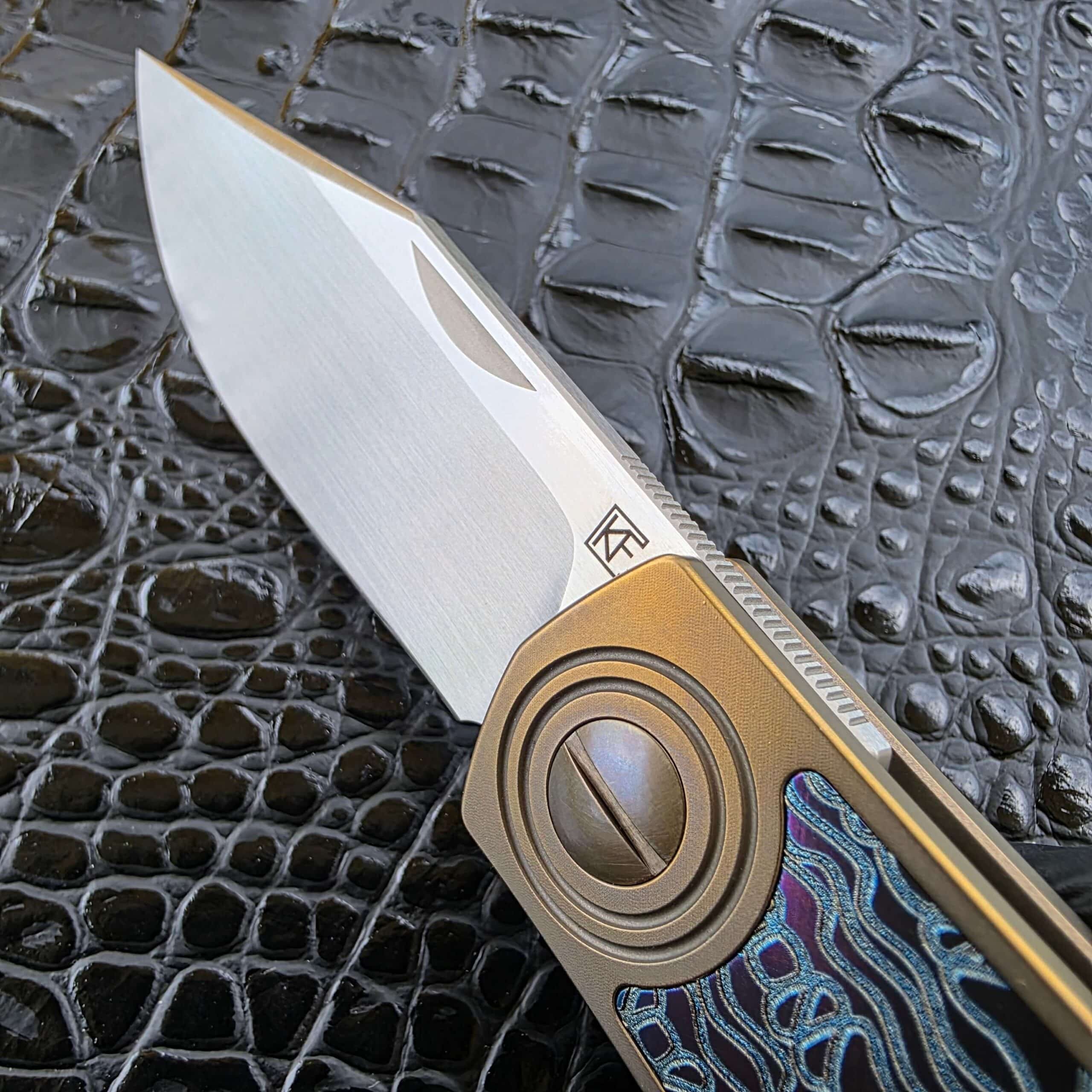 CKF Veksha M390 blade and concentric titanium pivot