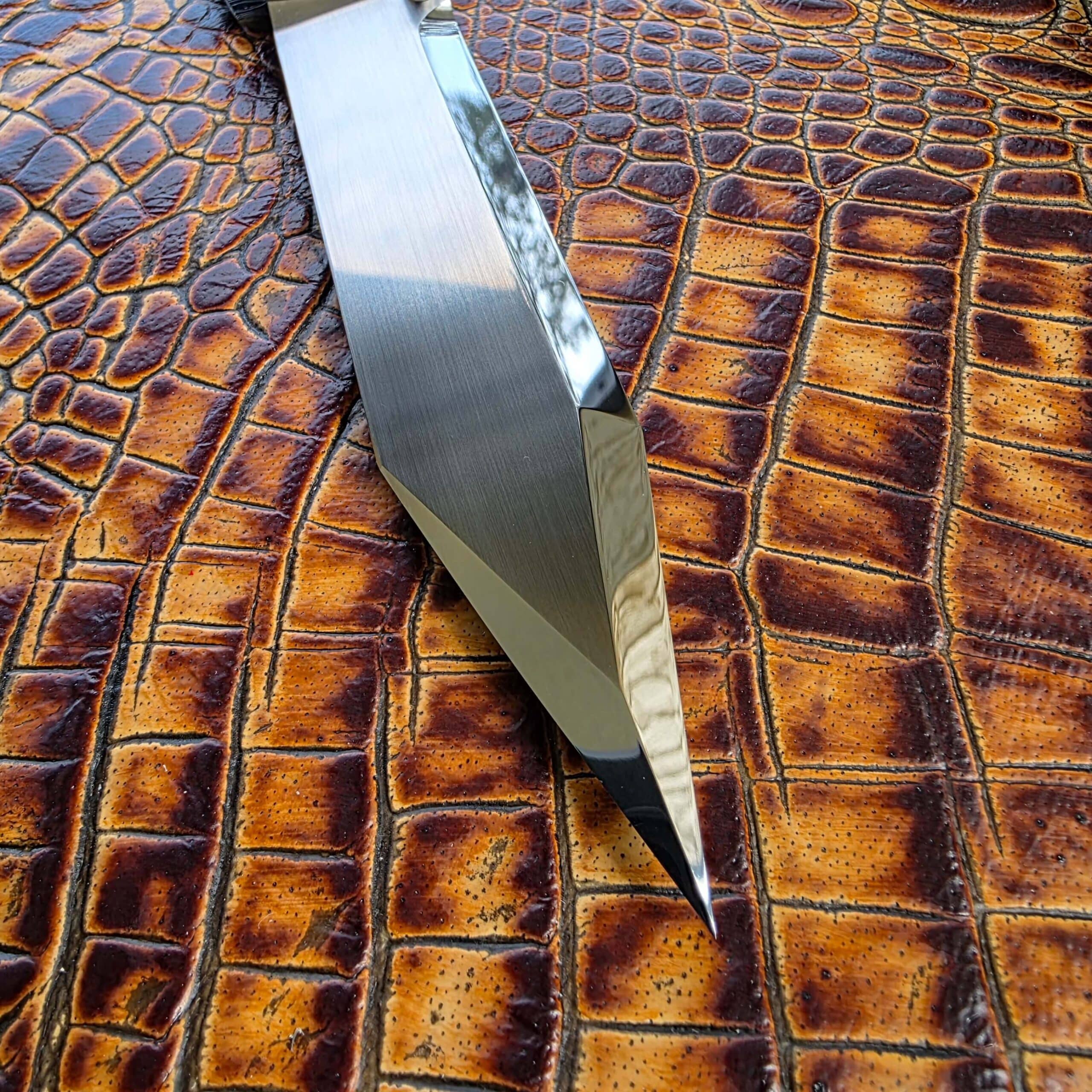 Compound-ground blade tip on Compostella Square XL S