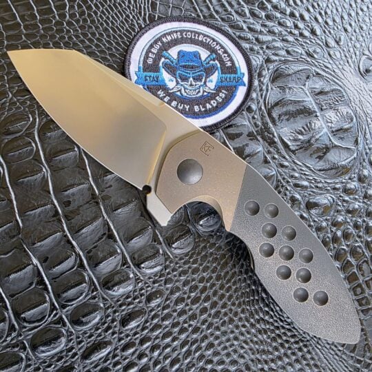 Custom Knife Factory Capitalist #43 open show side with M390 blade