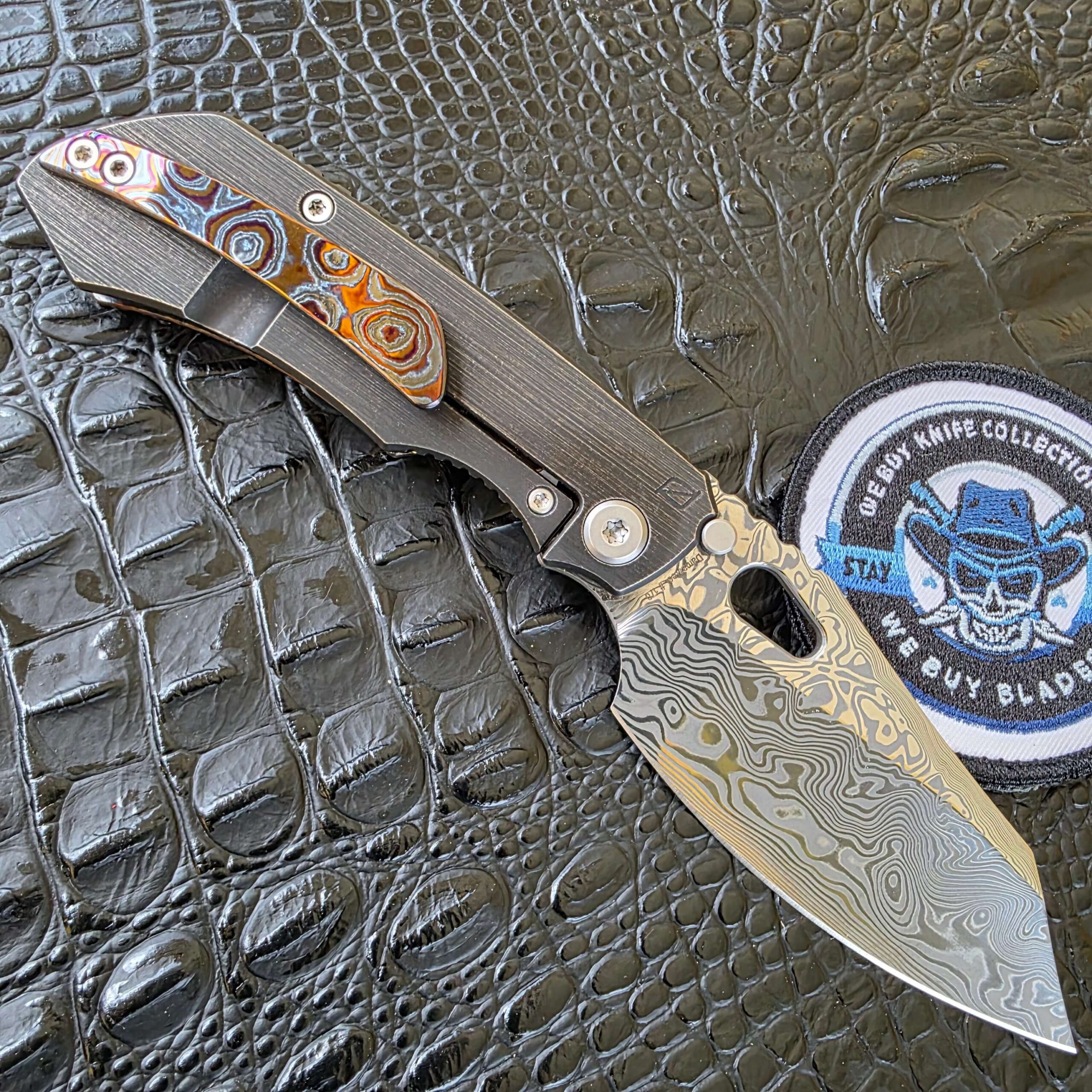 CKF Evo 3.0E open clip side with Damasteel blade and ZircuTi clip