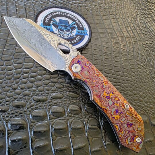 CKF Evo 3.0E open show side with full ZircuTi scale