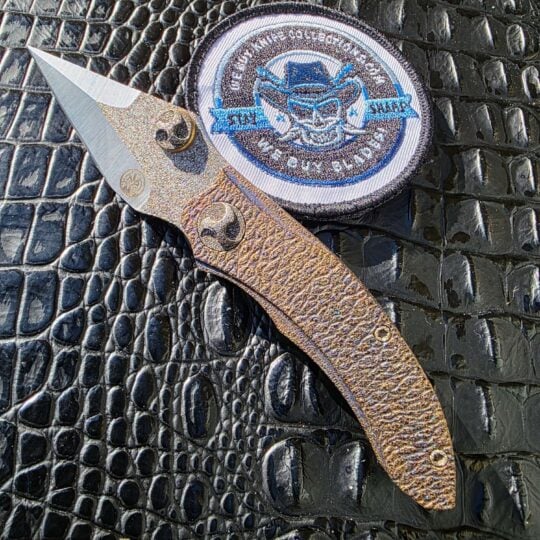 Glenn Waters Viper 2 open show side with M390 spear-point blade