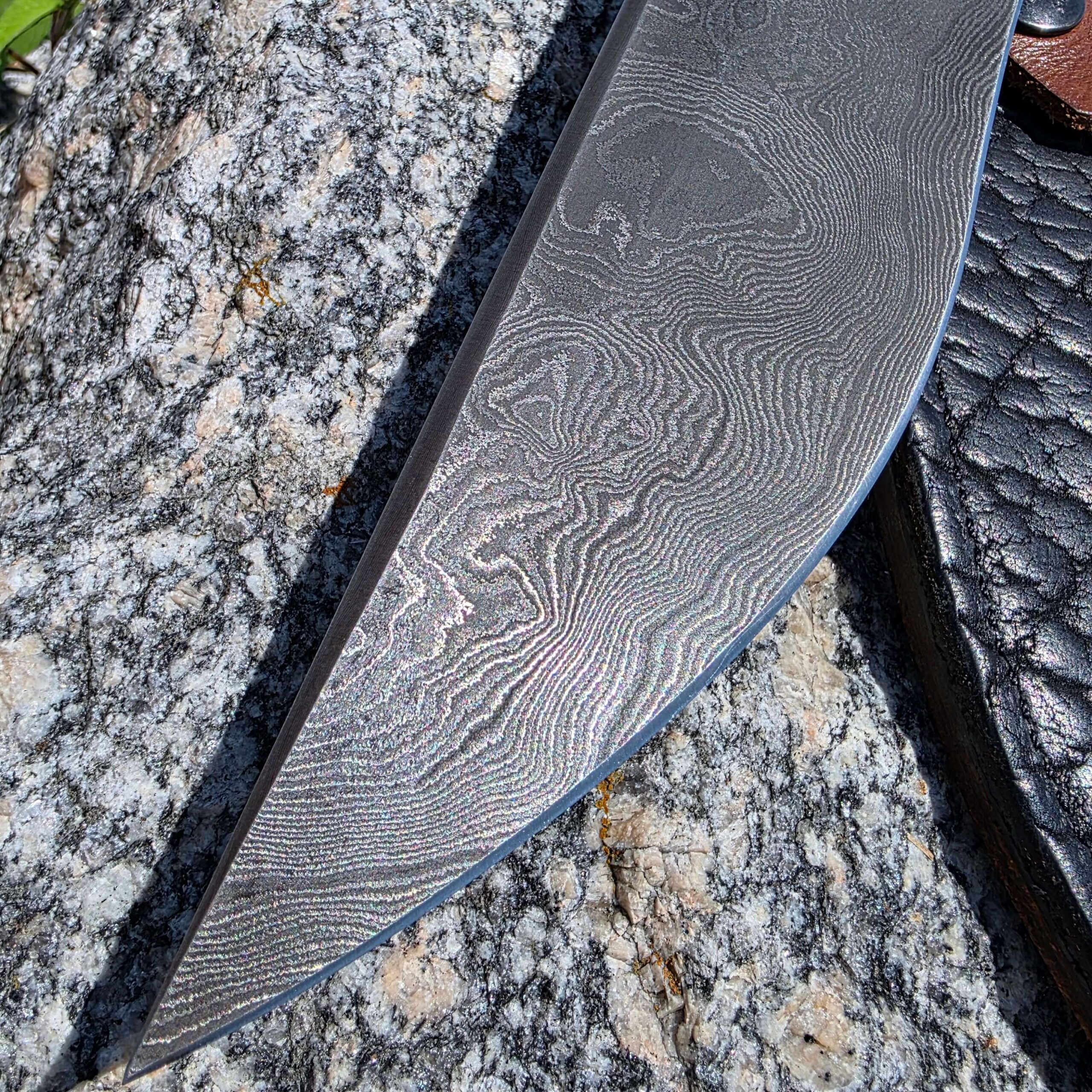 Half Face Blades Charity Bowie Damascus blade close-up
