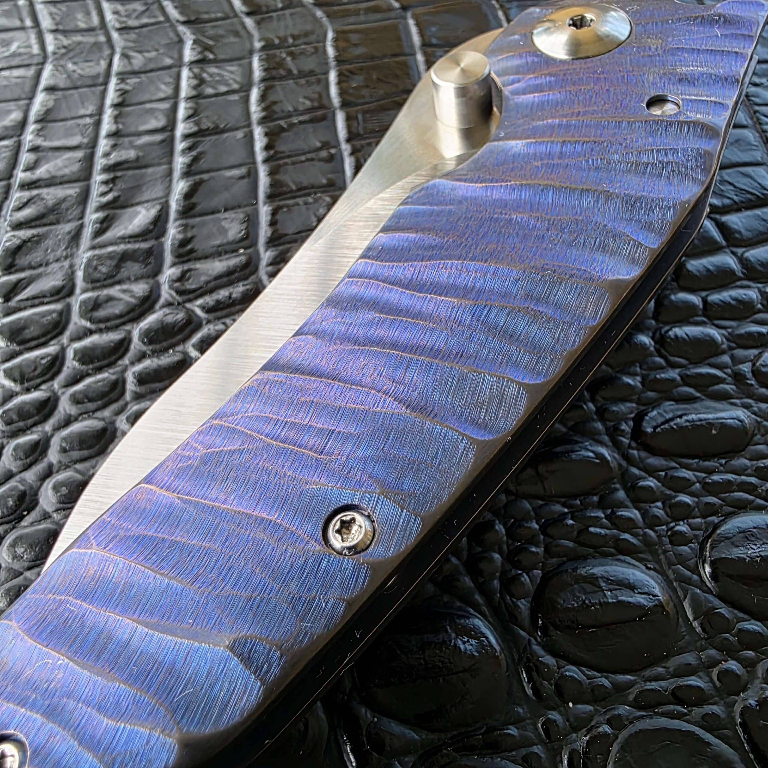 John Gray Custom Thuck blue anodized titanium color detail