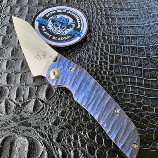 John Gray Custom Thuck MagnaCut custom knife with blue titanium rock grind handle
