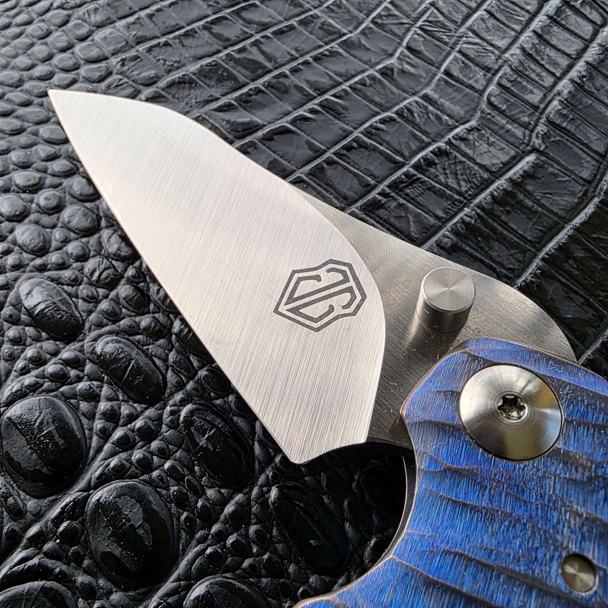 John Gray Custom Thuck satin MagnaCut blade close-up