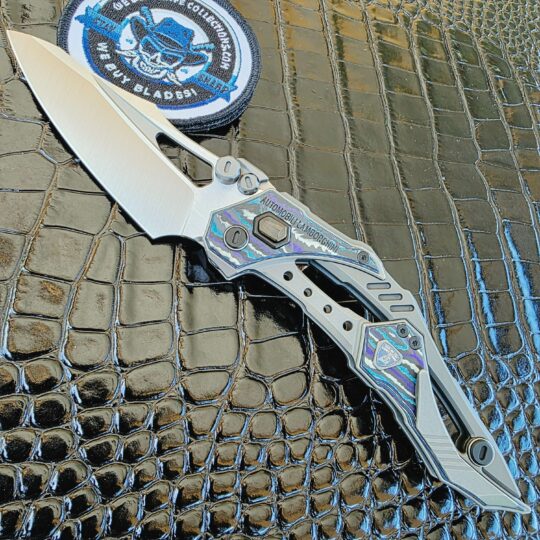 NOC Knives Automobili Lamborghini NKMT6310 open with M390 blade and Mars Valley inlays