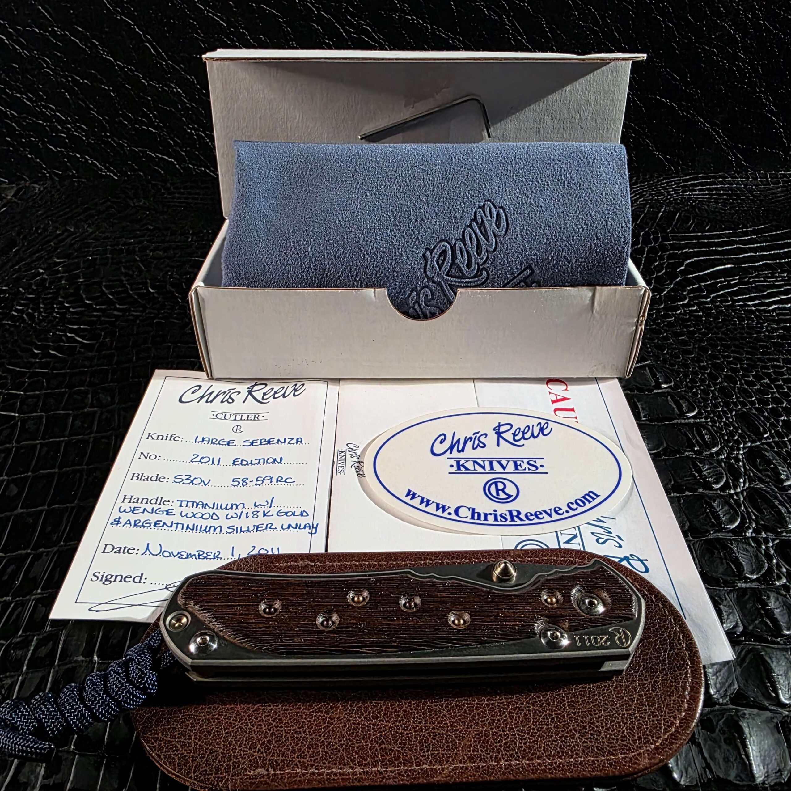 Chris Reeve Large Sebenza 2011 Edition with box, signed COA, cloth, and leather slip