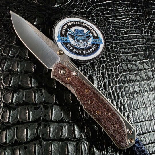 Chris Reeve Large Sebenza 2011 Edition open with Workbench Wenge and gold and silver inlays