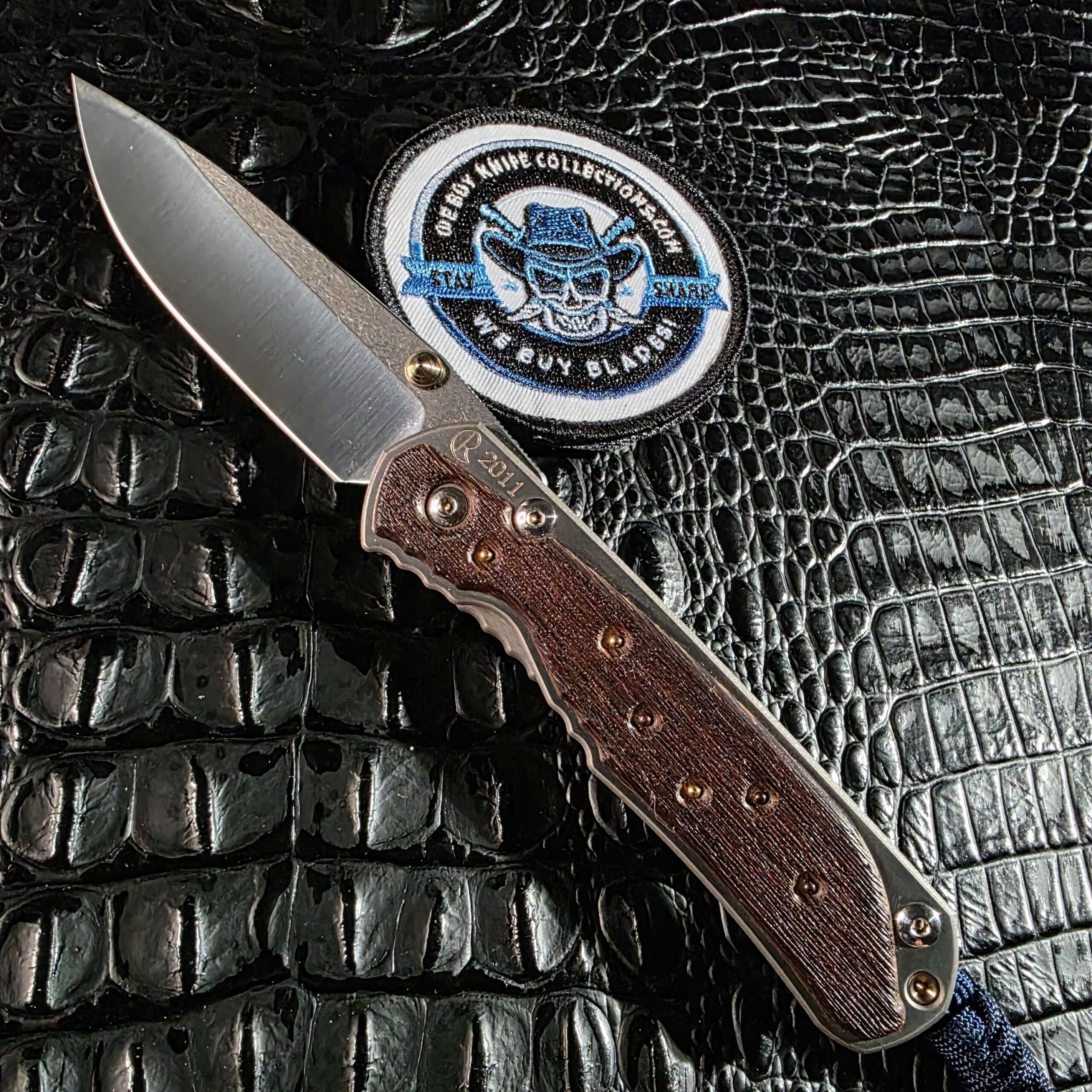 Chris Reeve Large Sebenza 2011 Edition open with Workbench Wenge and gold and silver inlays