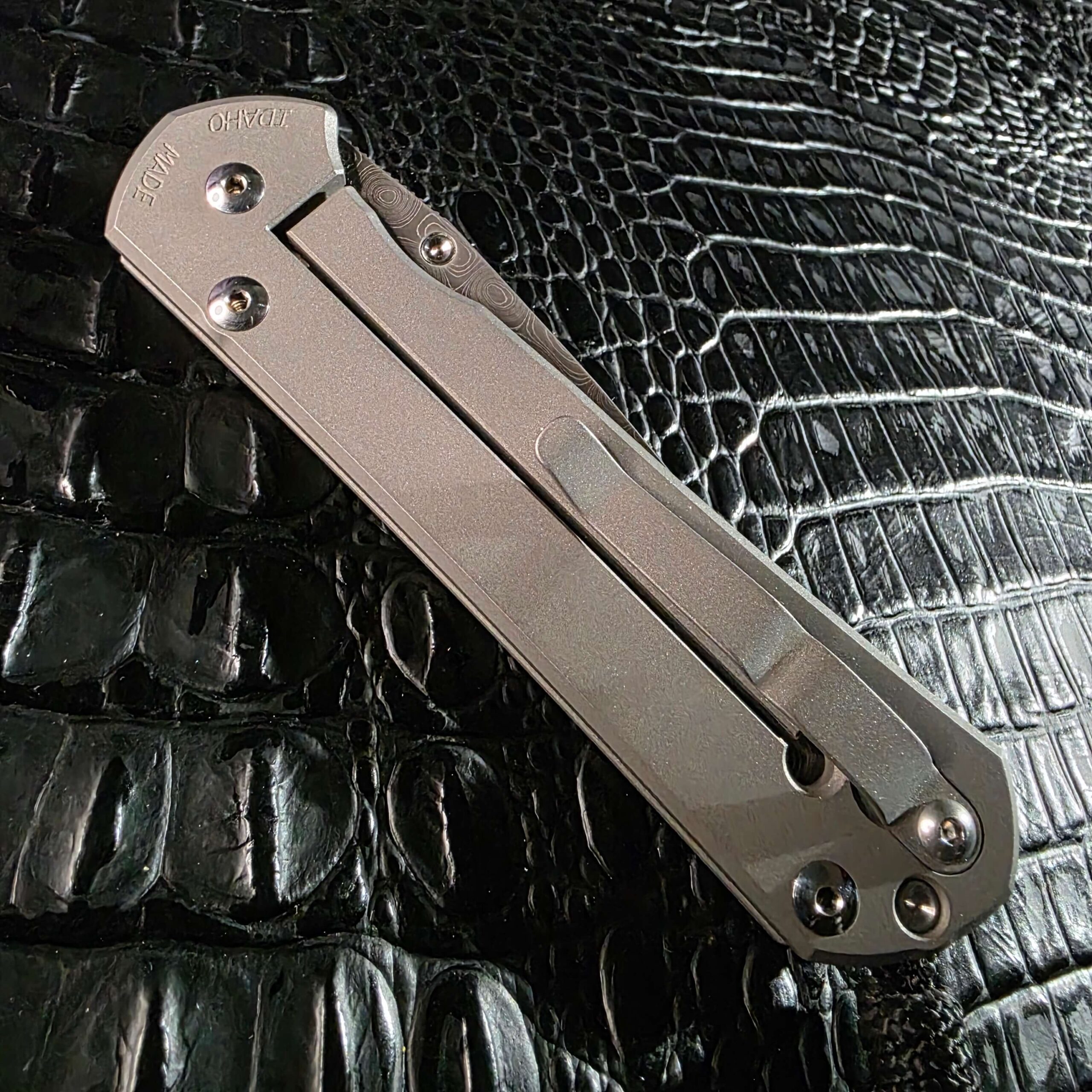 Closed lock side of Chris Reeve Sebenza 21 Unique Graphic with pocket clip