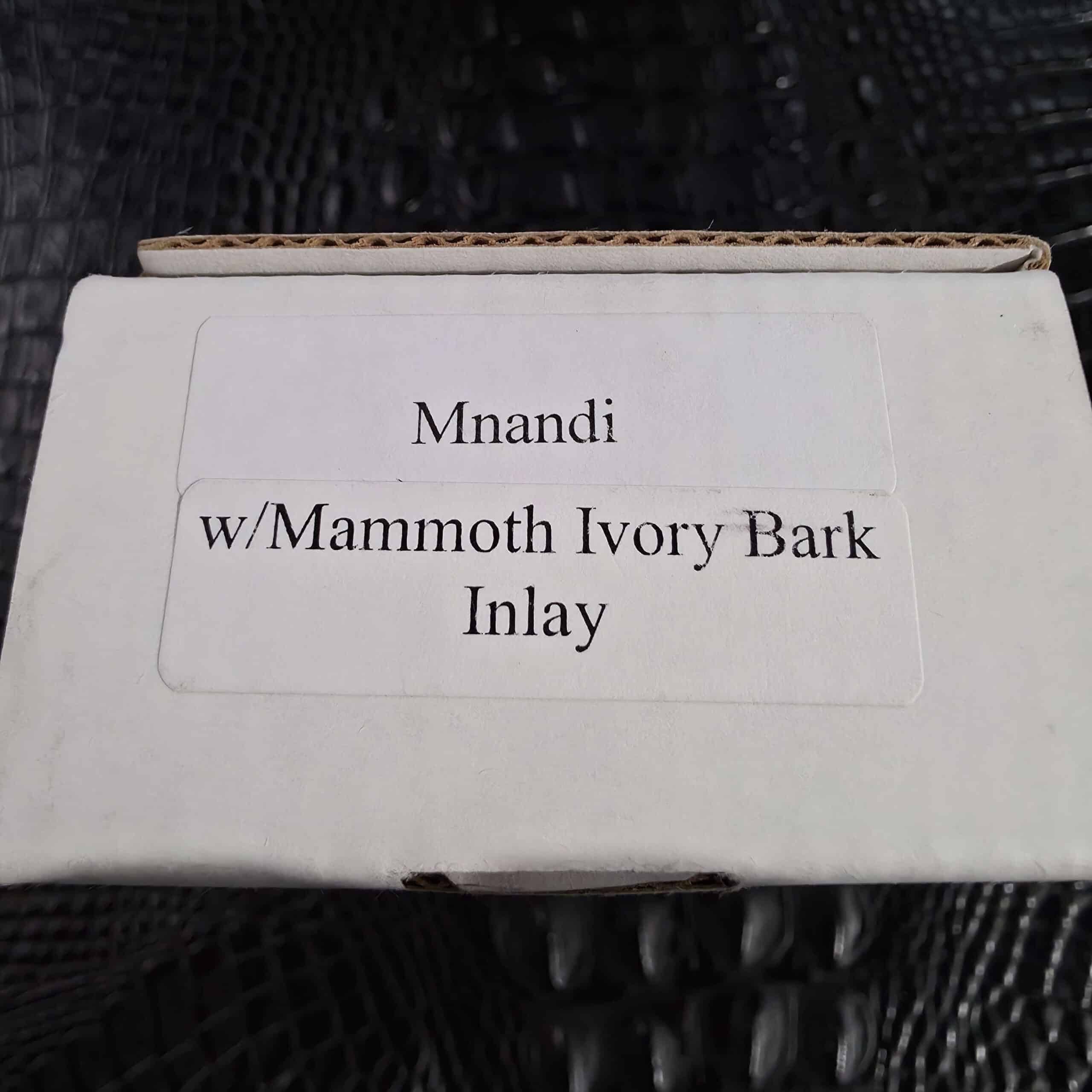 Chris Reeve box label reading Mnandi with Mammoth Ivory Bark Inlay
