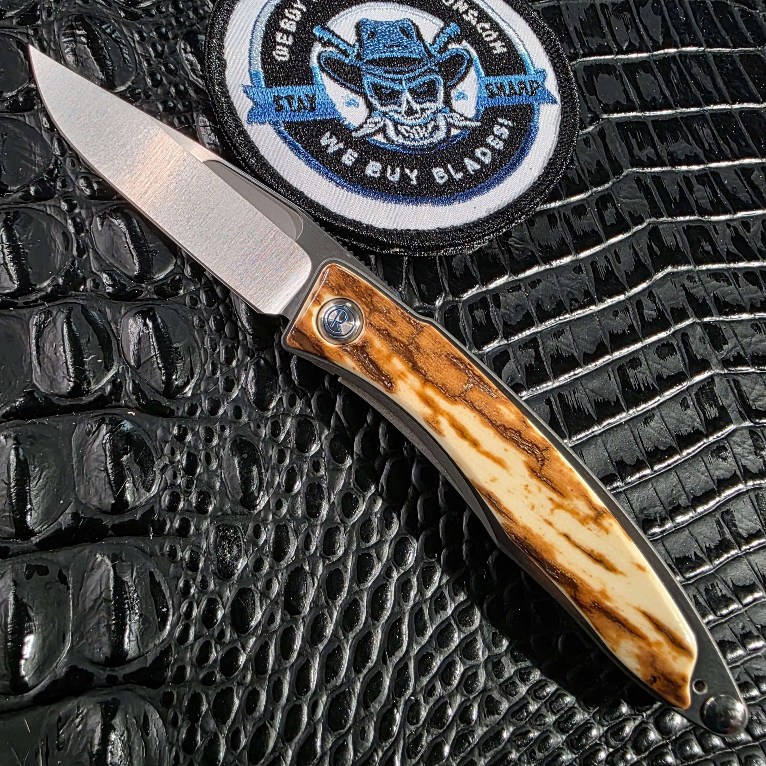 Chris Reeve Mnandi 2011 open with mammoth bark ivory inlays and S30V blade