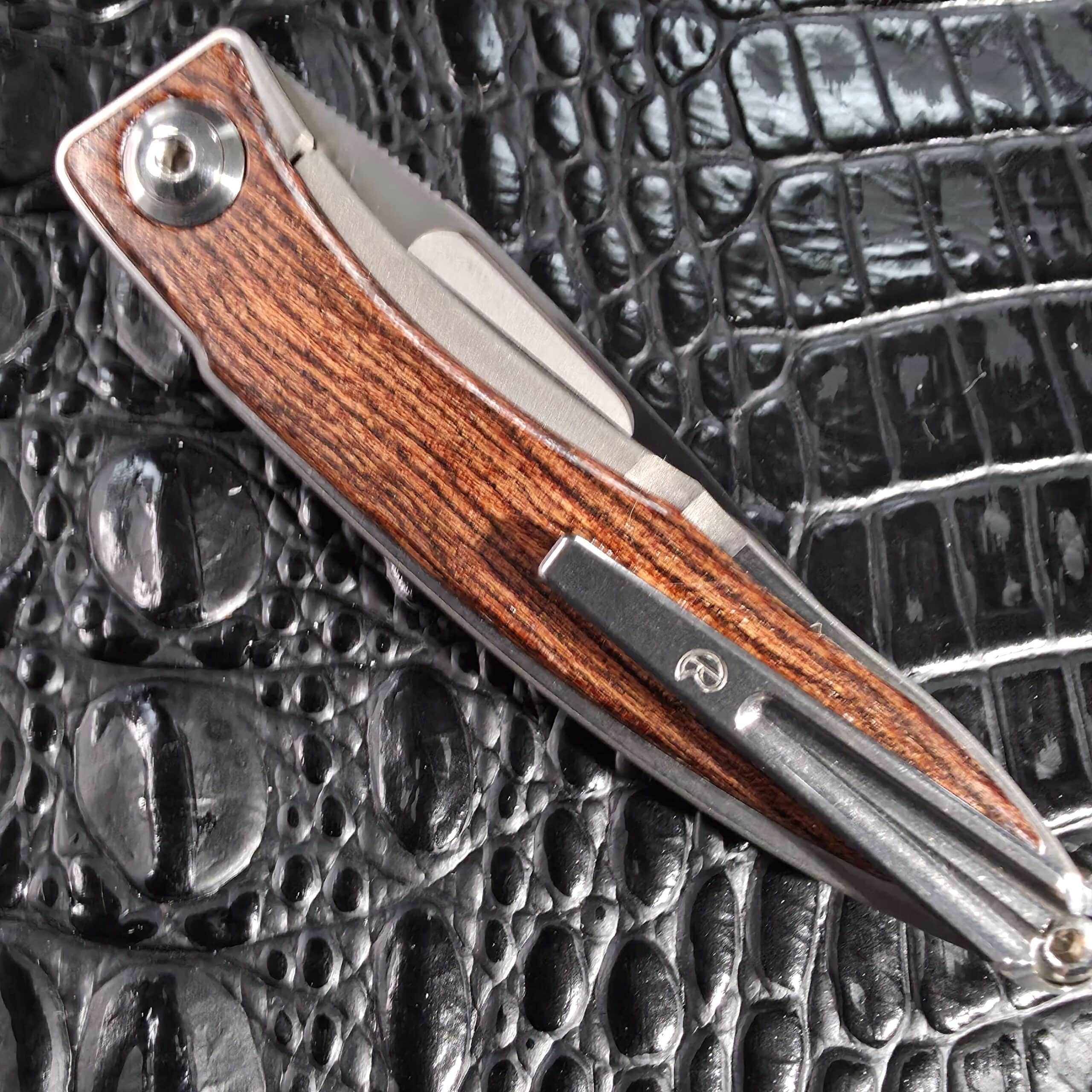 Angled closed view of the Chris Reeve Mnandi Bocote with titanium pocket clip
