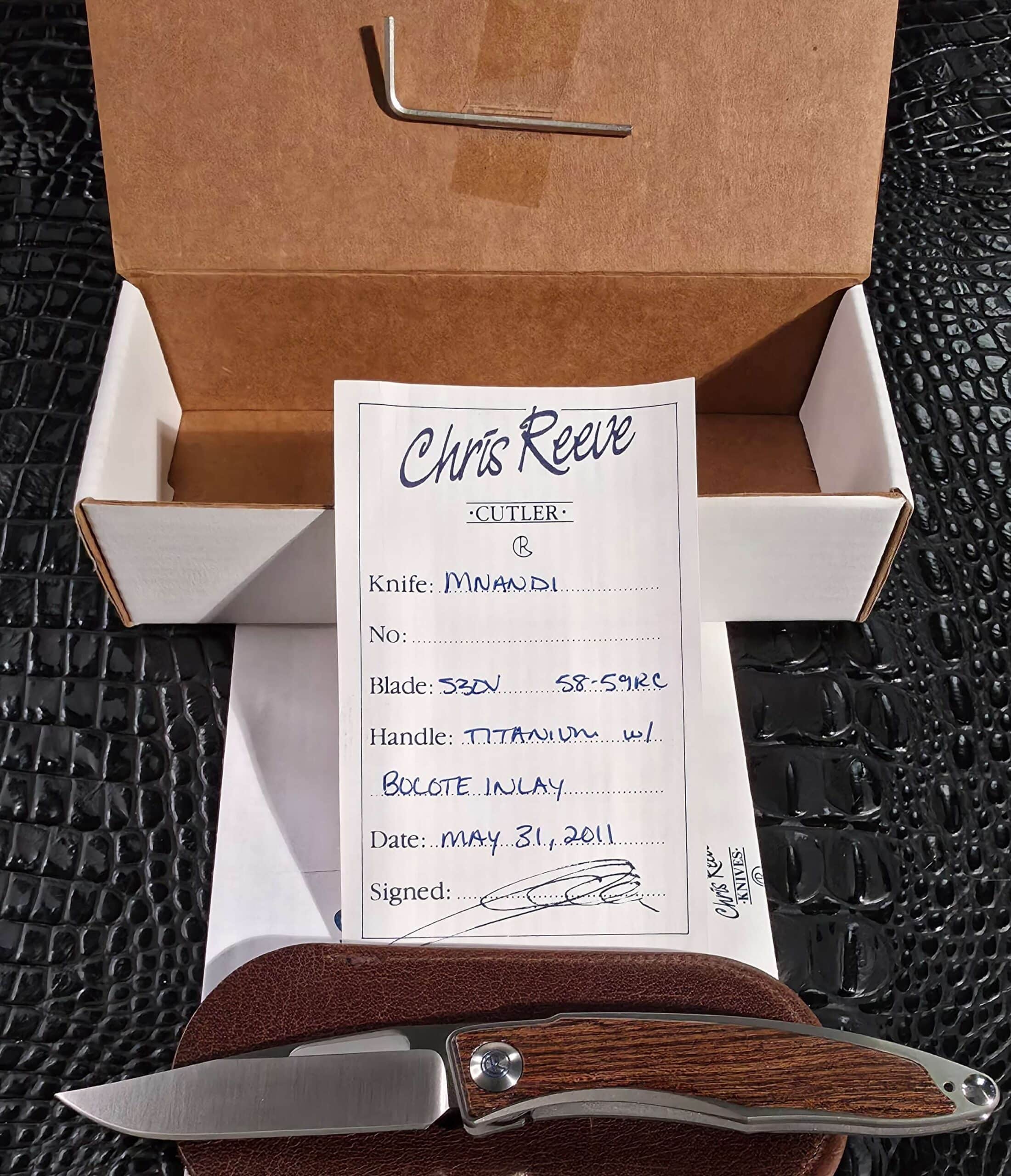 Chris Reeve Mnandi Bocote with original box, signed COA, leather slip, and Allen wrench