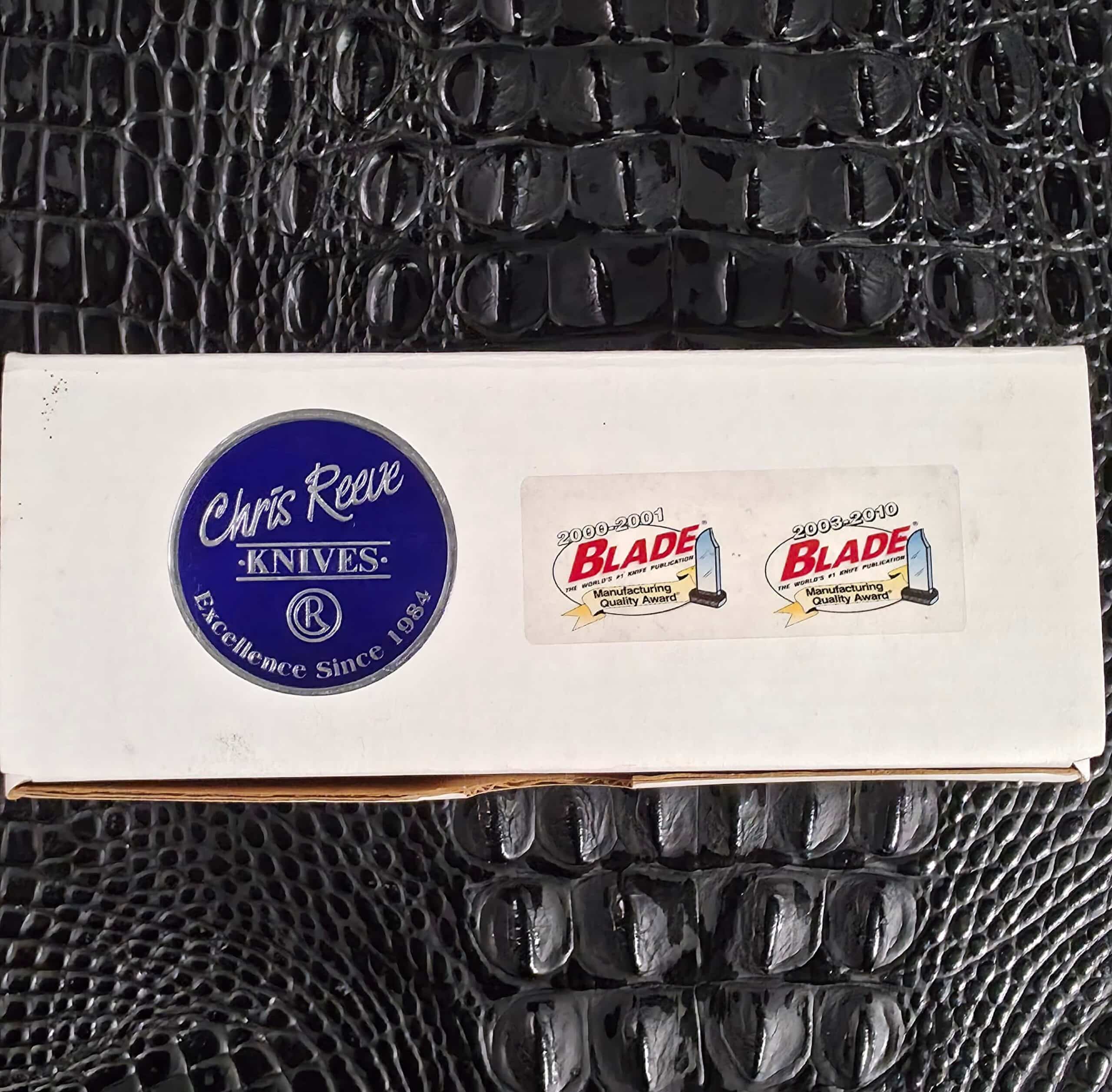 Original white Chris Reeve Knives box with BLADE Manufacturing Quality Award stickers