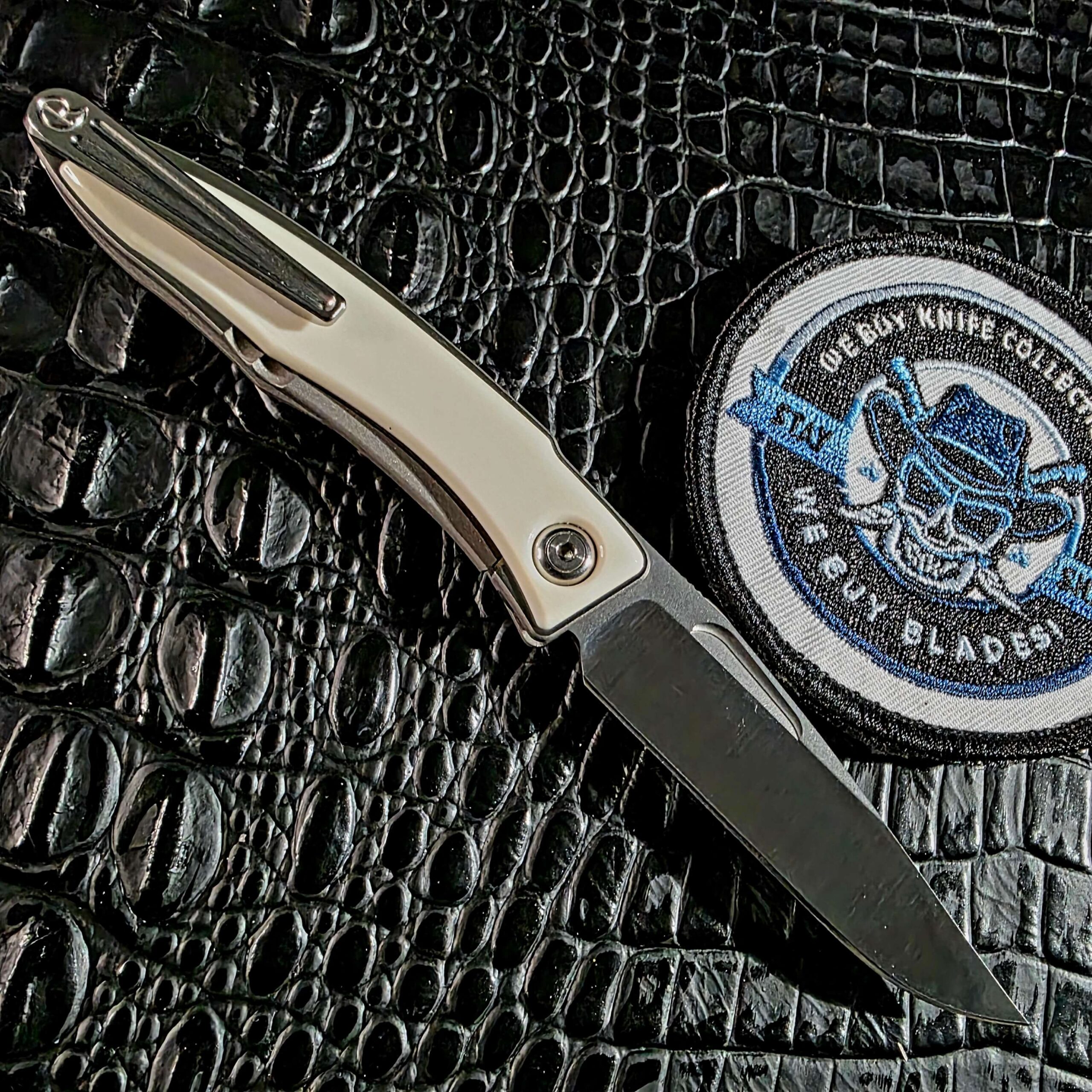 Clip side of the Chris Reeve Mnandi showing the machined 3D titanium pocket clip and second mammoth ivory inlay