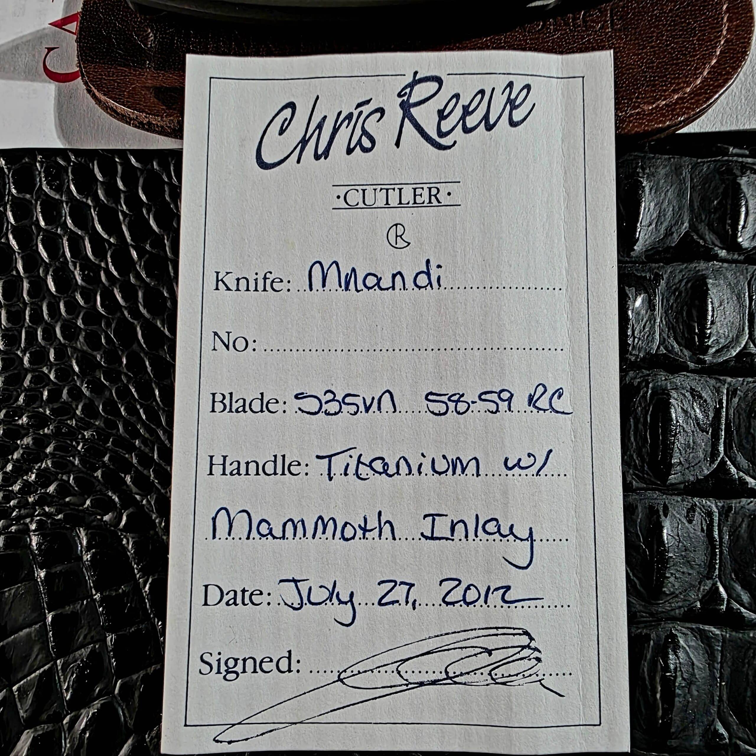 Signed Chris Reeve birth card for the Mnandi listing S35VN at 58 to 59 RC and titanium with mammoth inlay, dated July 27 2012