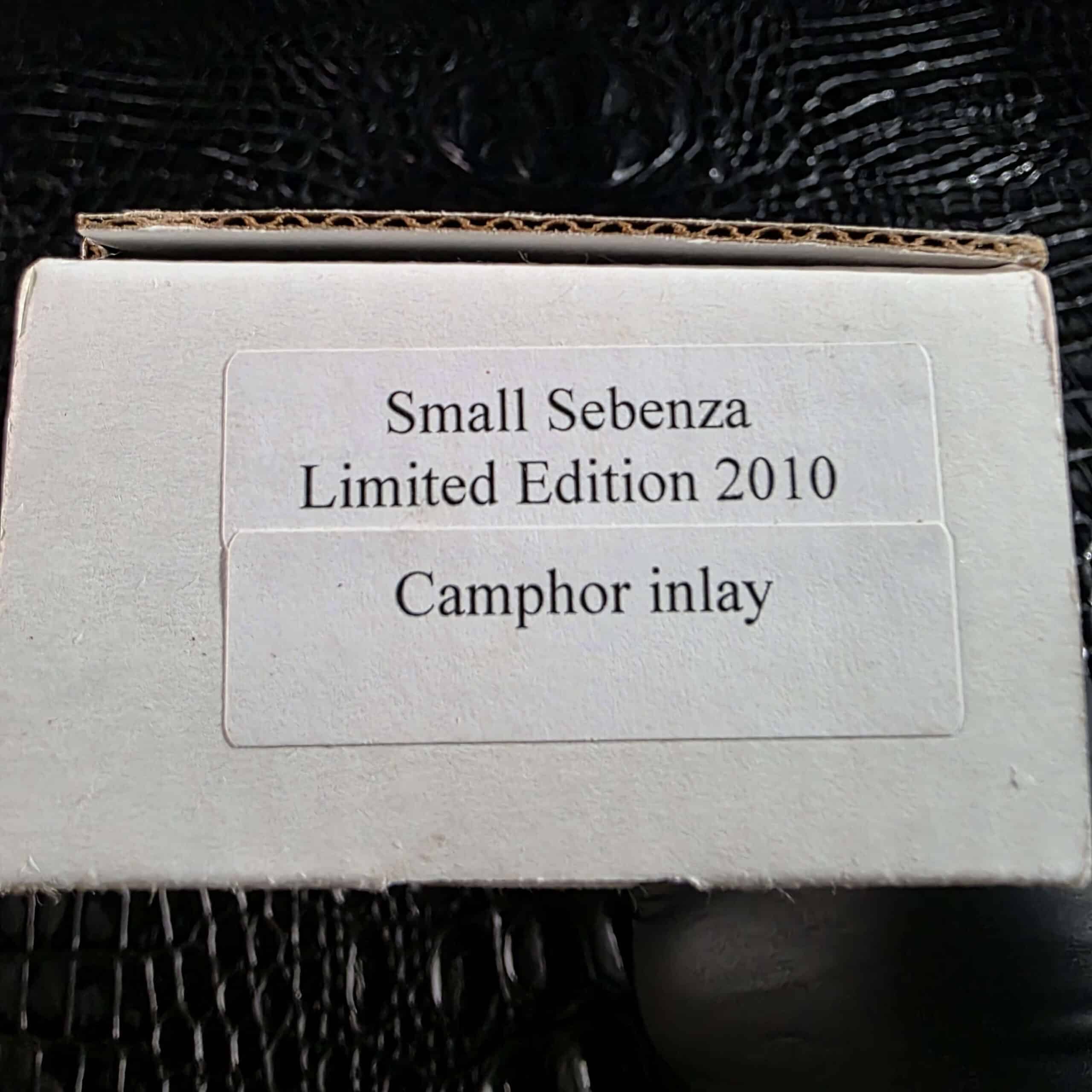 Original box end label reading Small Sebenza Limited Edition 2010 Camphor inlay
