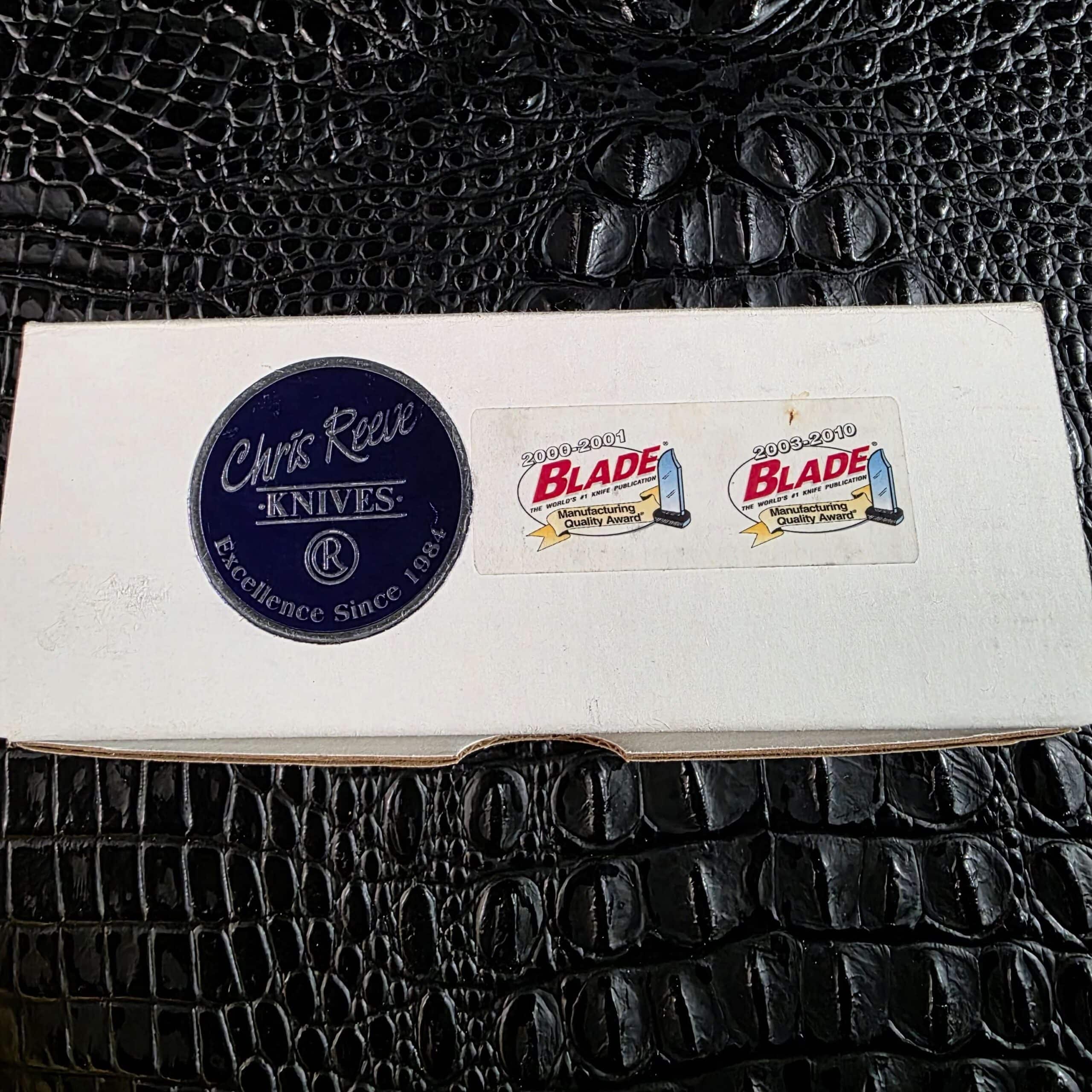 Original Chris Reeve Knives box with the Excellence Since 1984 medallion and BLADE Manufacturing Quality Award stickers
