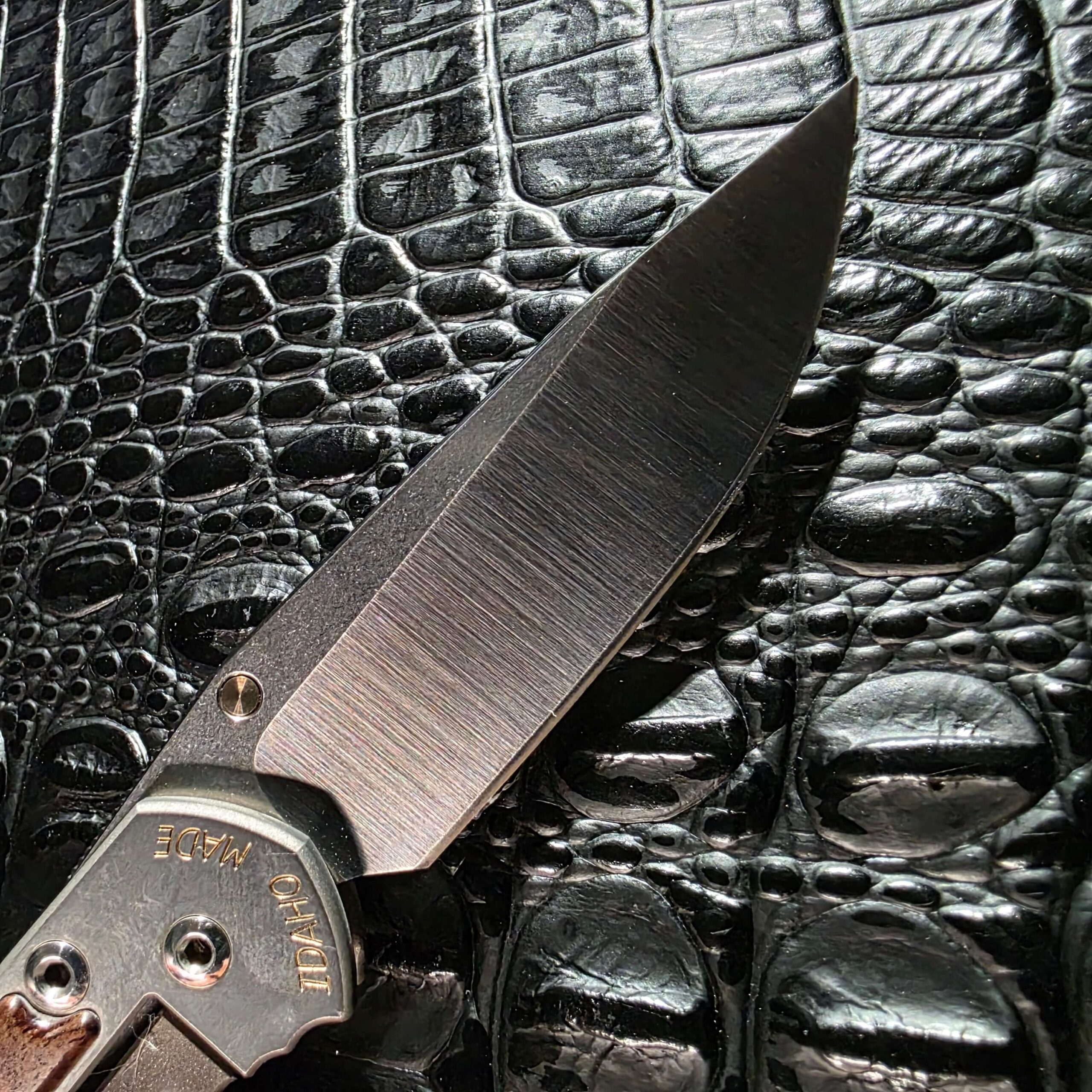 Tumbled CPM-S30V drop point blade on the Chris Reeve Small Sebenza 2010 Annual with the Idaho Made engraving visible