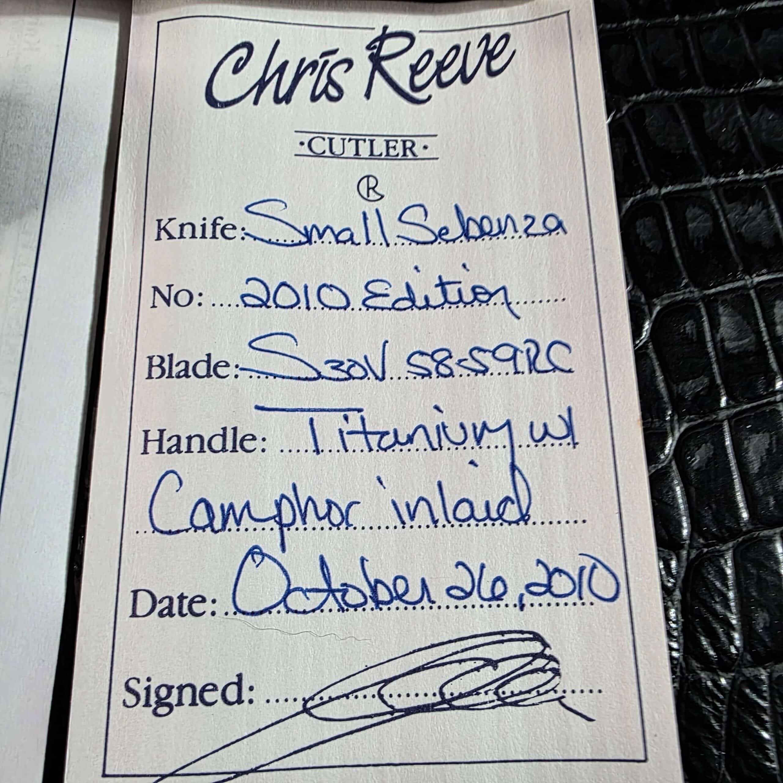 Signed Chris Reeve certificate of authenticity for the Small Sebenza 2010 Edition listing S30V at 58 to 59 RC and titanium with camphor inlay, dated October 26 2010