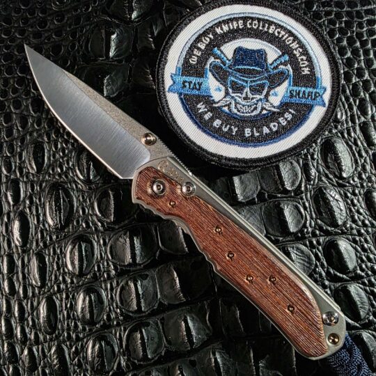 Chris Reeve Small Sebenza 2011 Edition open with Workbench Wenge and gold and silver inlays