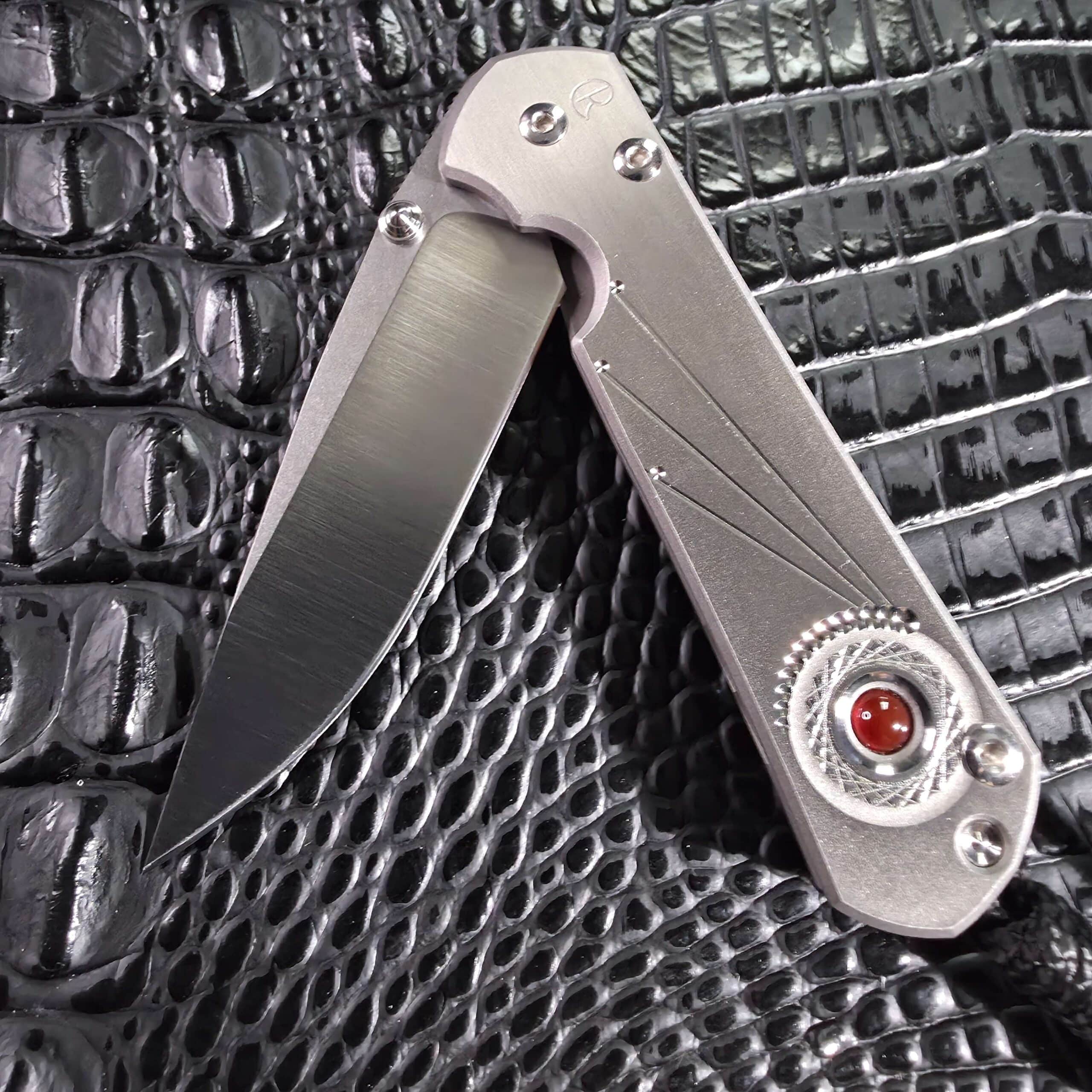Chris Reeve Small Sebenza 21 half open showing blade travel and Integral Lock geometry