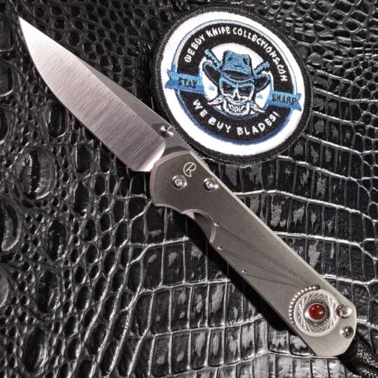 Chris Reeve Small Sebenza 21 Carnelian open with polished S35VN blade and titanium frame