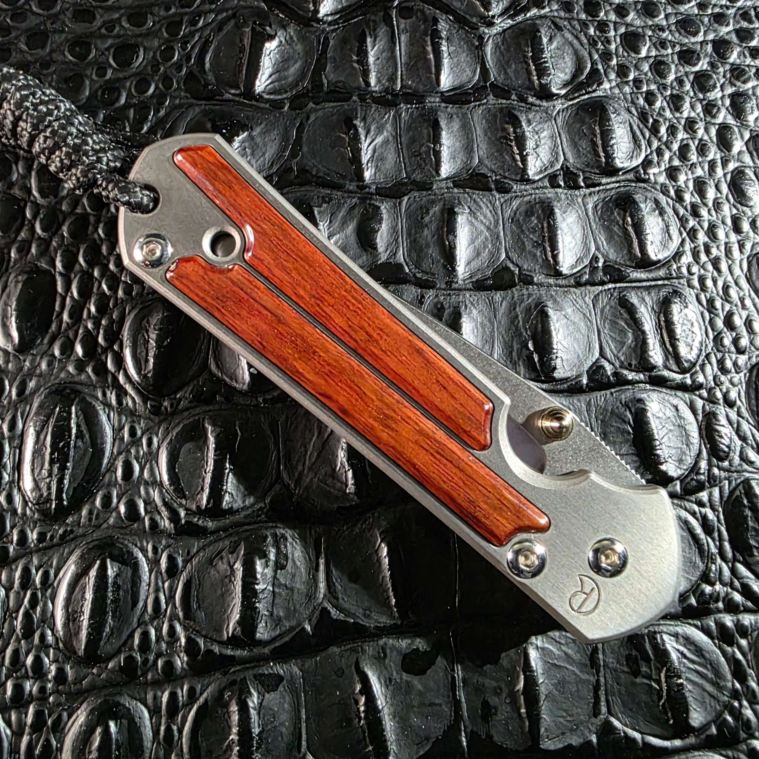 Closed Chris Reeve Small Sebenza Classic Wood with snakewood inlays